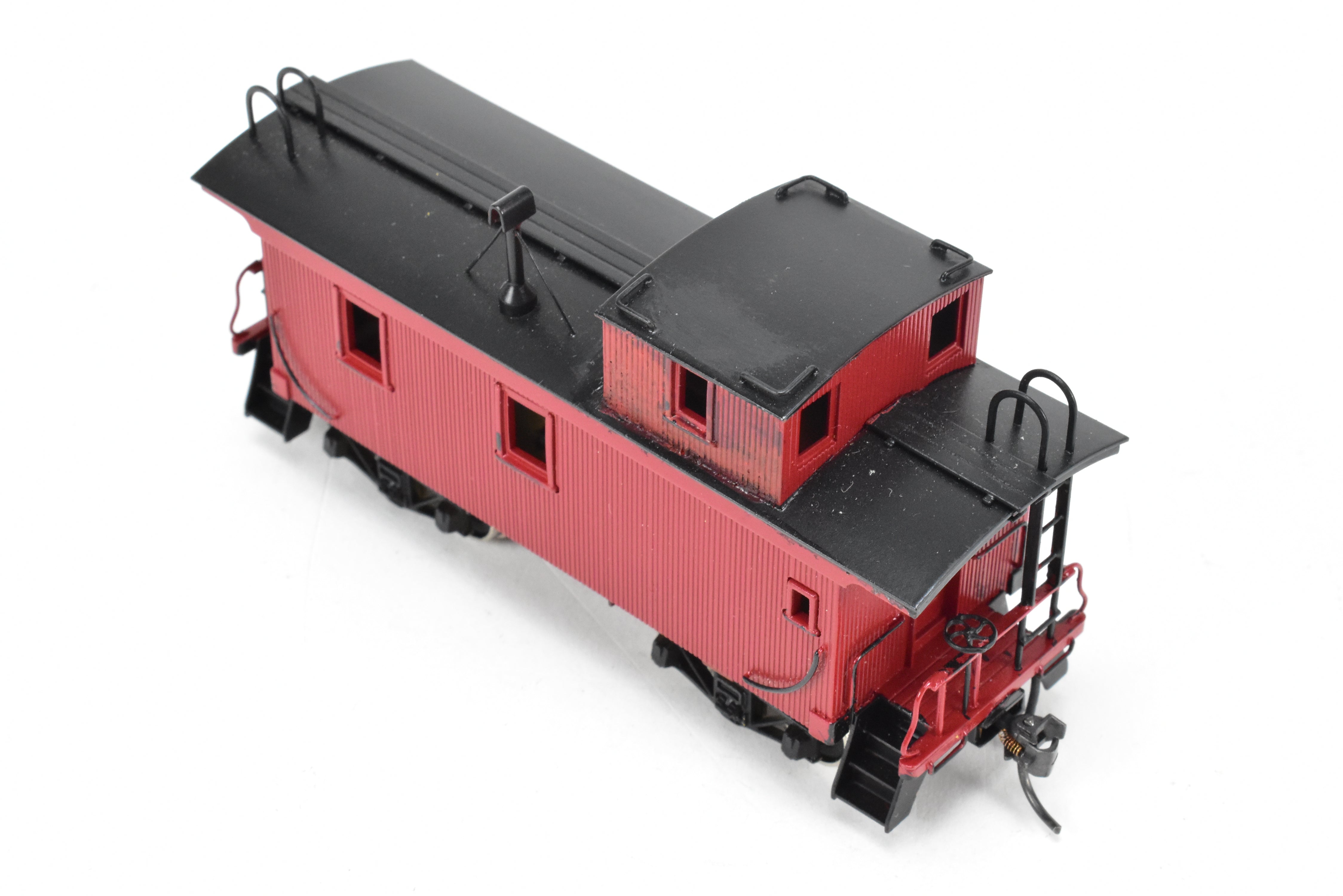 HO Scale Brass Model of Northwest Short Line (NWSL) and Northern Pacific (NP) 1700 Series Wood Caboose, Unlettered Custom - Painted in Caboose Red with Black Roof