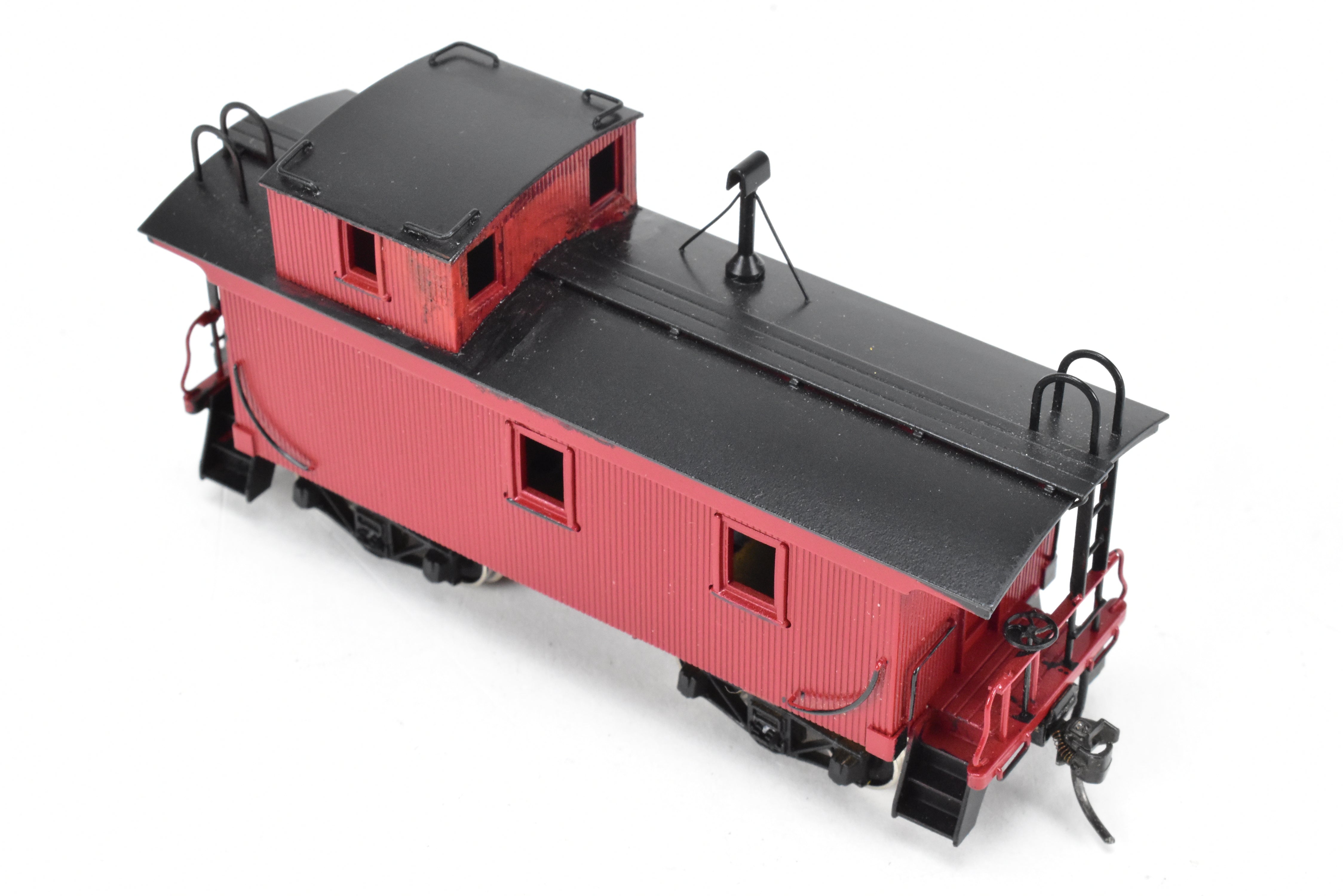 HO Scale Brass Model of Northwest Short Line (NWSL) and Northern Pacific (NP) 1700 Series Wood Caboose, Unlettered Custom - Painted in Caboose Red with Black Roof
