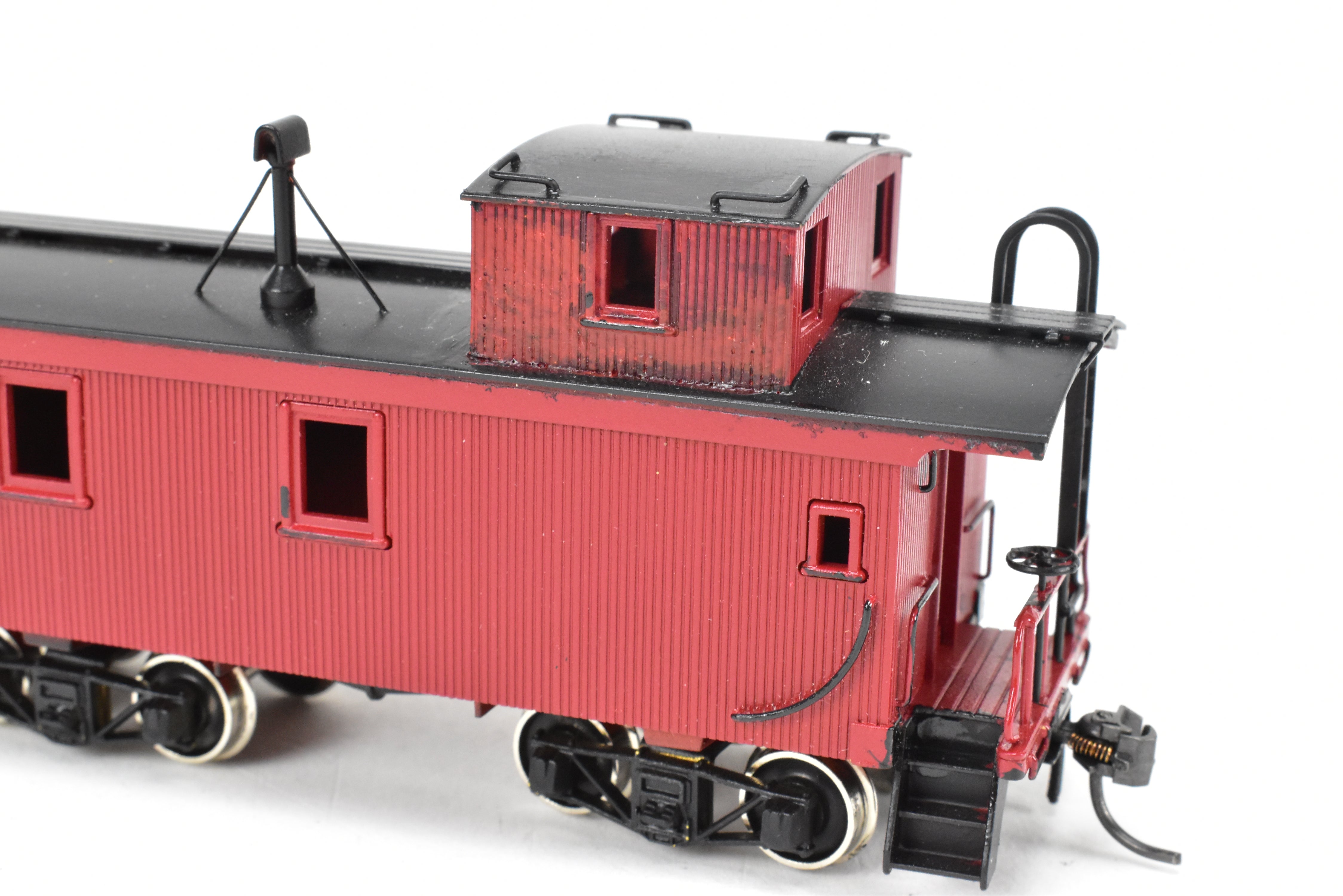 HO Scale Brass Model of Northwest Short Line (NWSL) and Northern Pacific (NP) 1700 Series Wood Caboose, Unlettered Custom - Painted in Caboose Red with Black Roof
