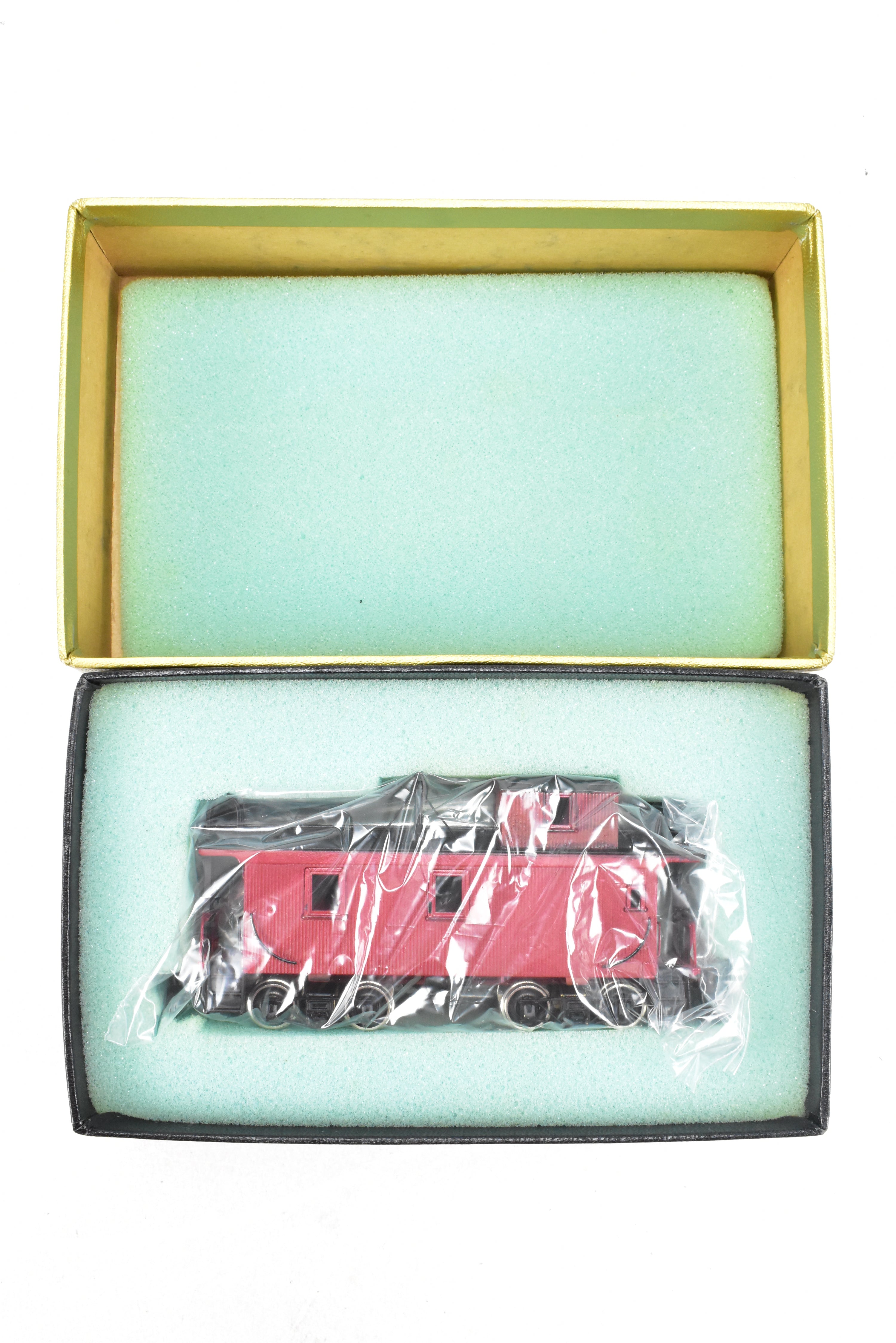 HO Scale Brass Model of Northwest Short Line (NWSL) and Northern Pacific (NP) 1700 Series Wood Caboose, Unlettered Custom - Painted in Caboose Red with Black Roof