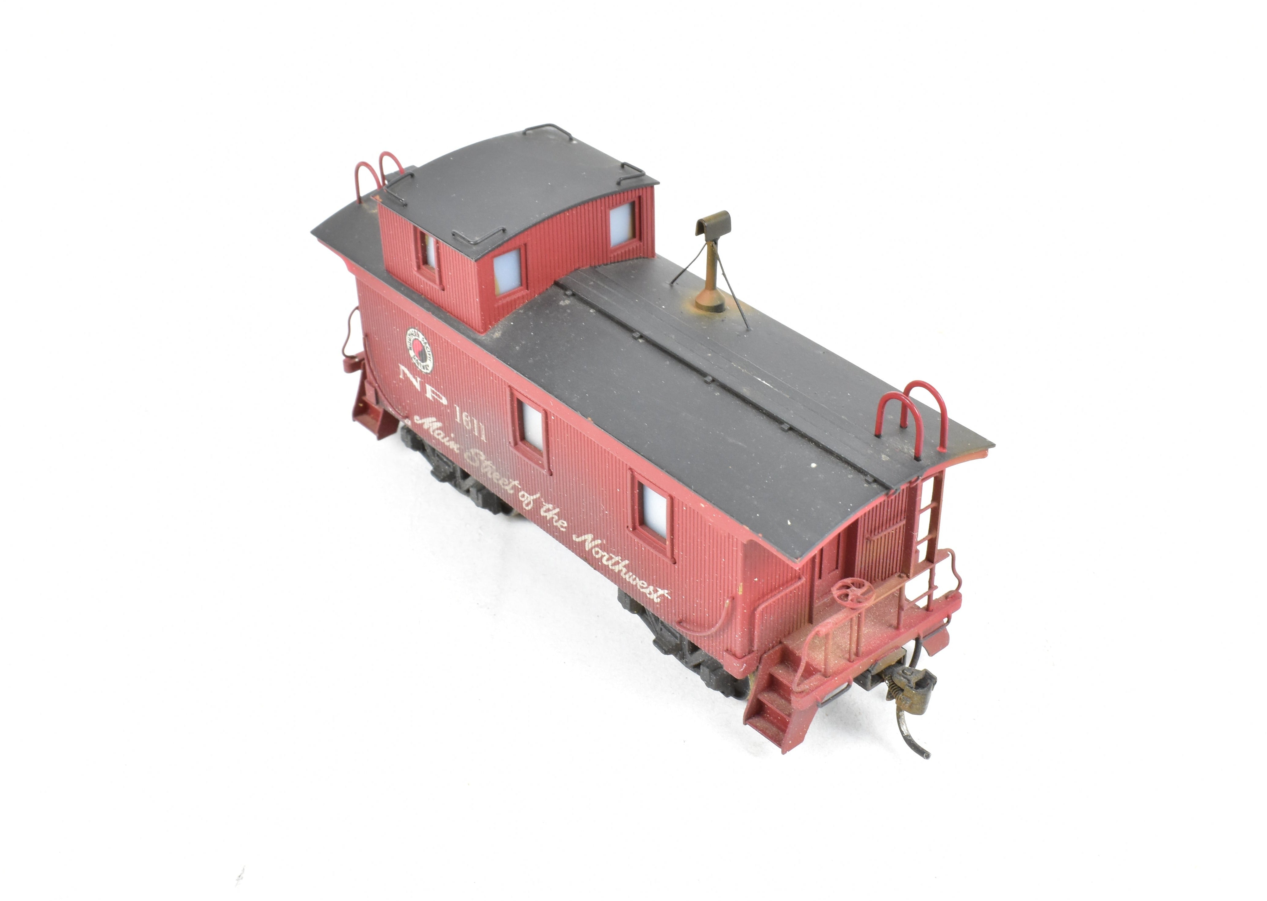 HO Scale Brass Model of NorthWest Short Line (NWSL) and Northern Pacific (NP) Wood Sided Caboose Custom Painted with Number 1611 for Model Train Enthusiasts