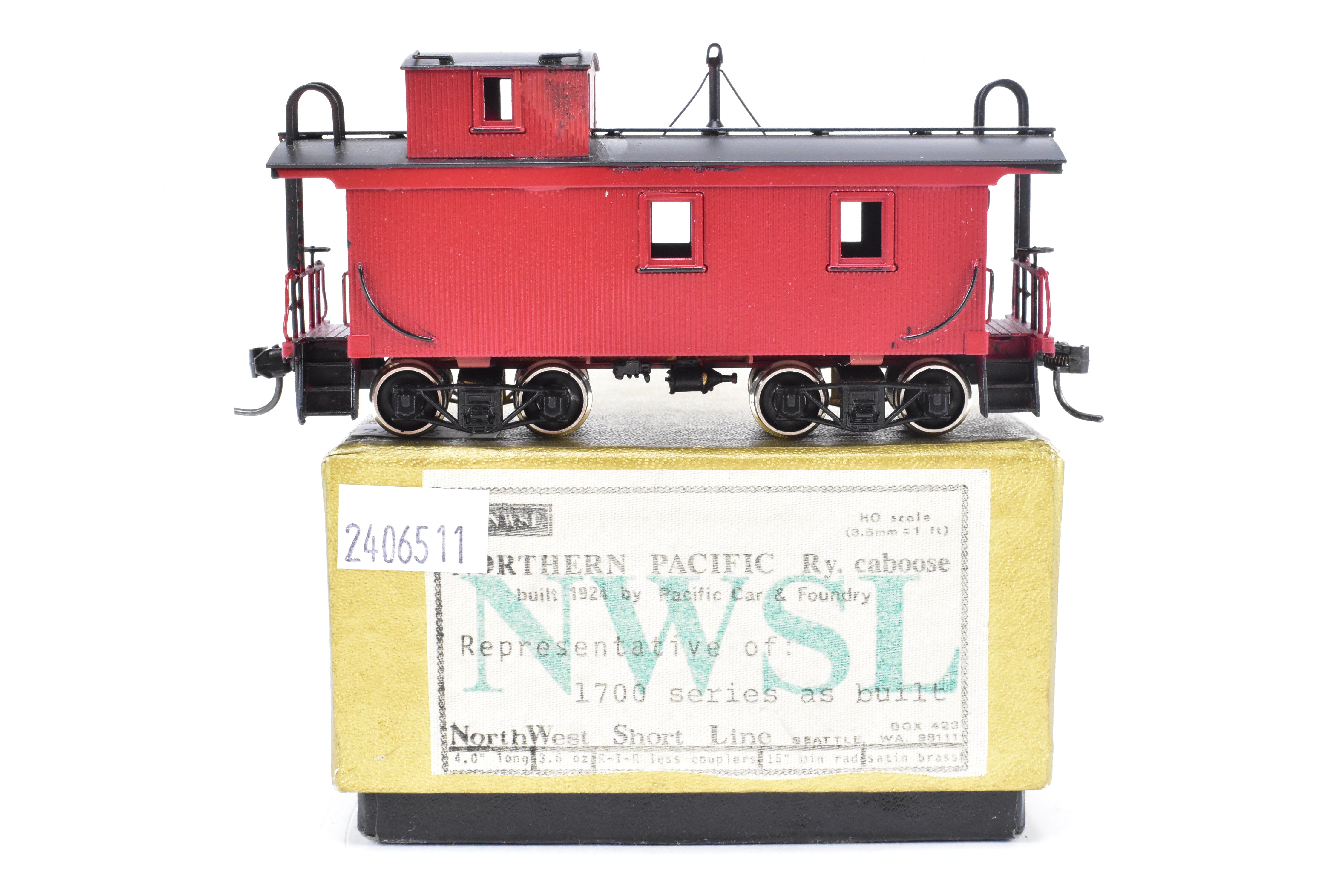 HO Scale Brass Model of Northwest Short Line (NWSL) and Northern Pacific (NP) 1700 Series Wood Caboose, Unlettered Custom - Painted in Caboose Red with Black Roof
