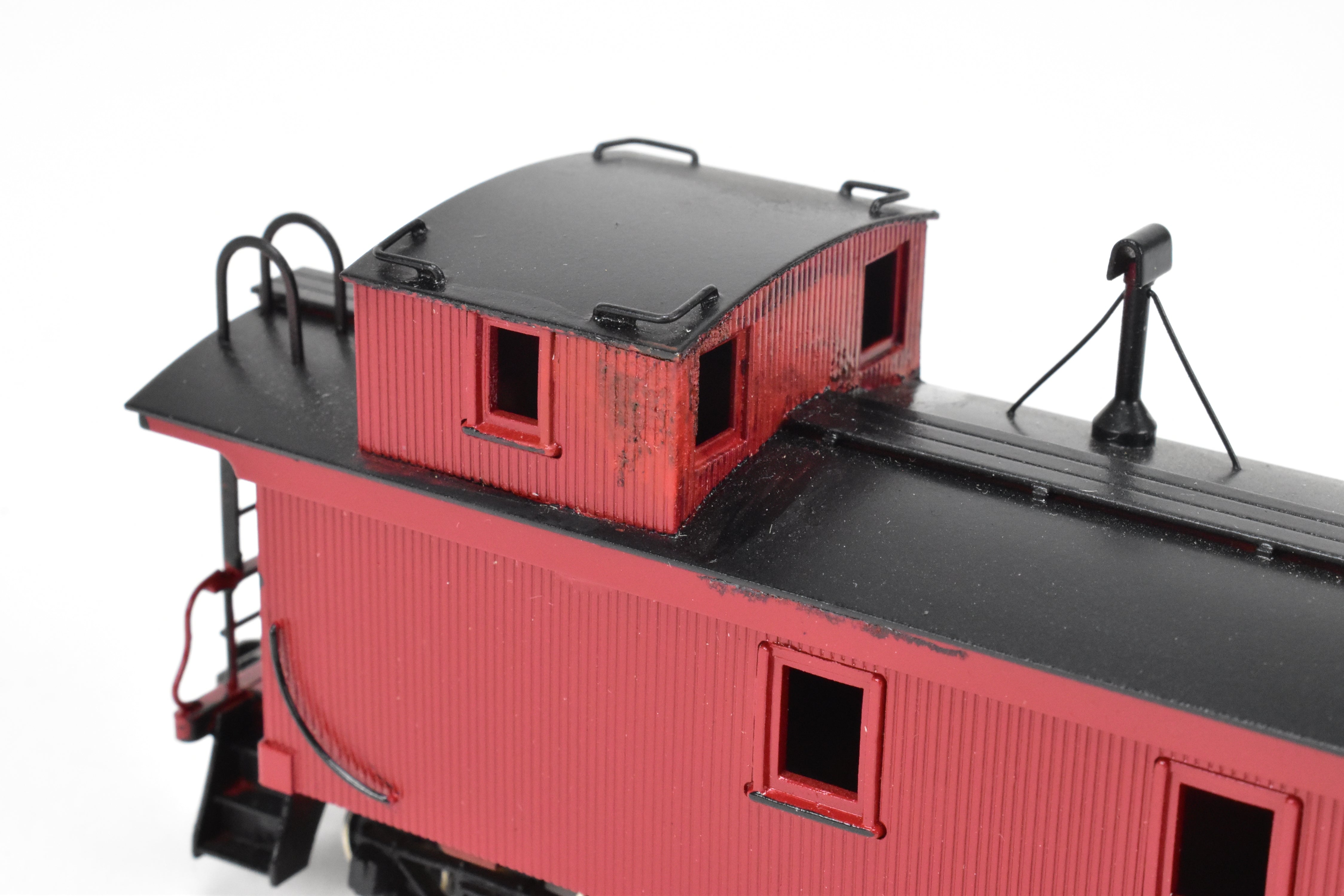 HO Scale Brass Model of Northwest Short Line (NWSL) and Northern Pacific (NP) 1700 Series Wood Caboose, Unlettered Custom - Painted in Caboose Red with Black Roof