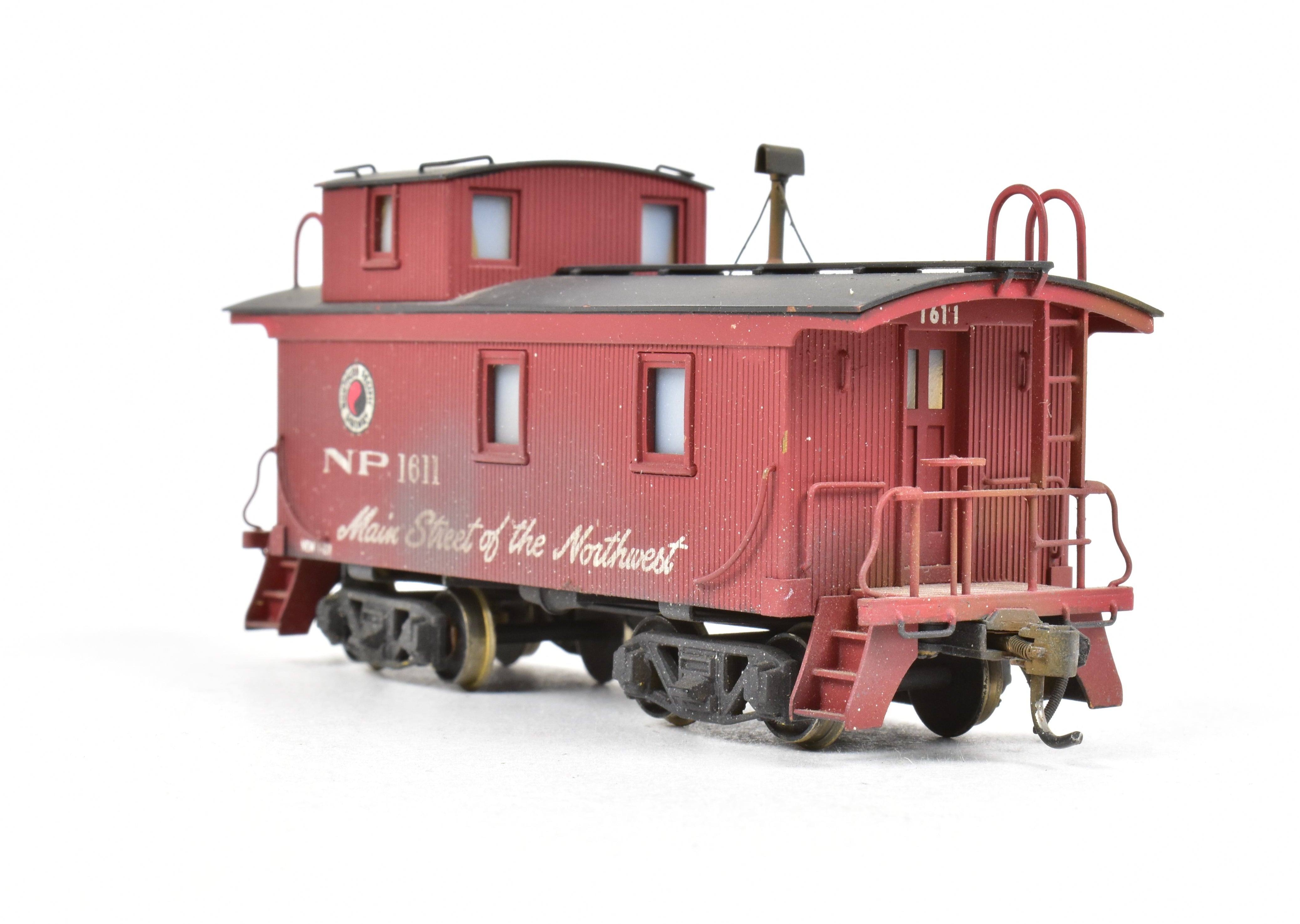 HO Scale Brass Model of NorthWest Short Line (NWSL) and Northern Pacific (NP) Wood Sided Caboose Custom Painted with Number 1611 for Model Train Enthusiasts