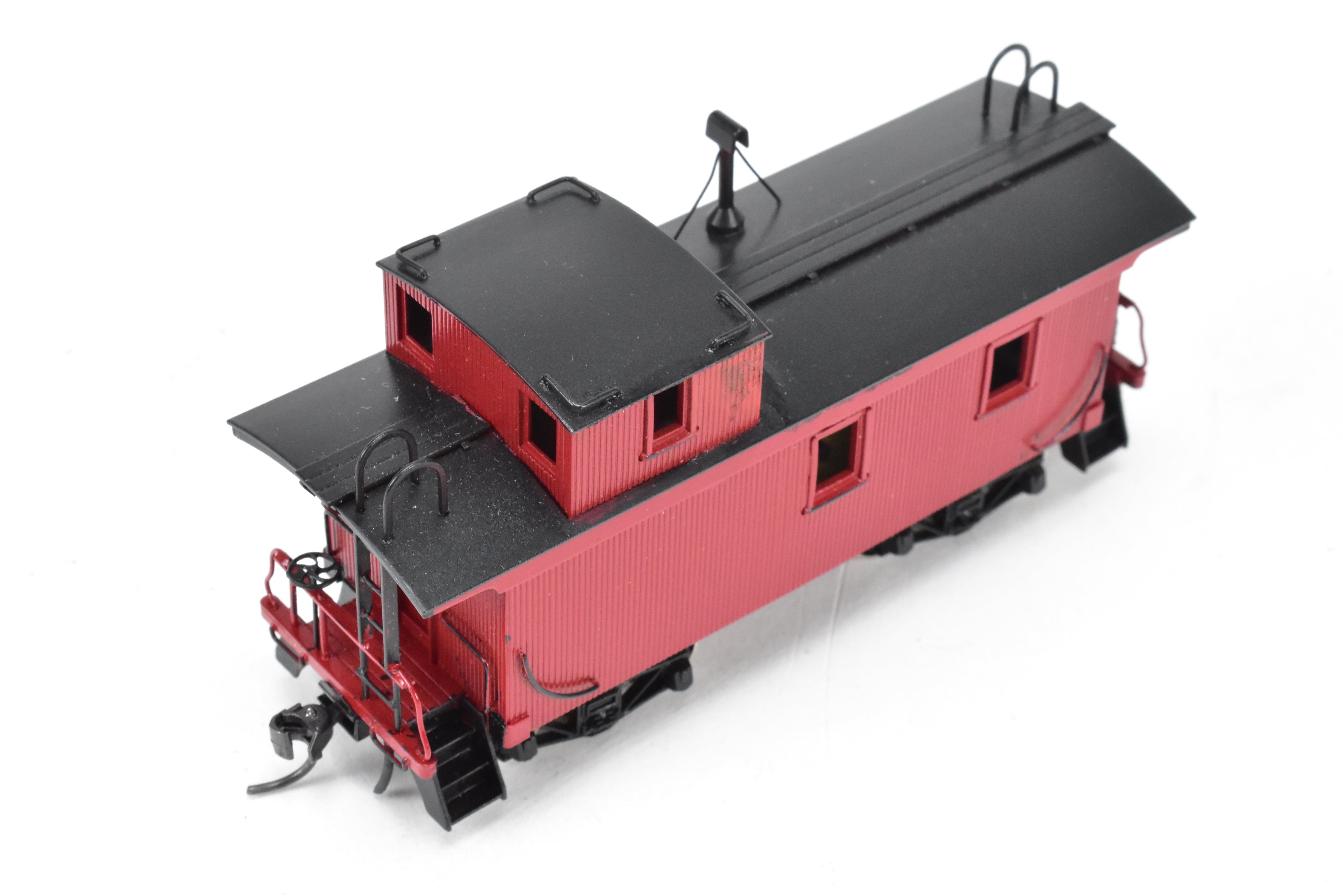 HO Scale Brass Model of Northwest Short Line (NWSL) and Northern Pacific (NP) 1700 Series Wood Caboose, Unlettered Custom - Painted in Caboose Red with Black Roof