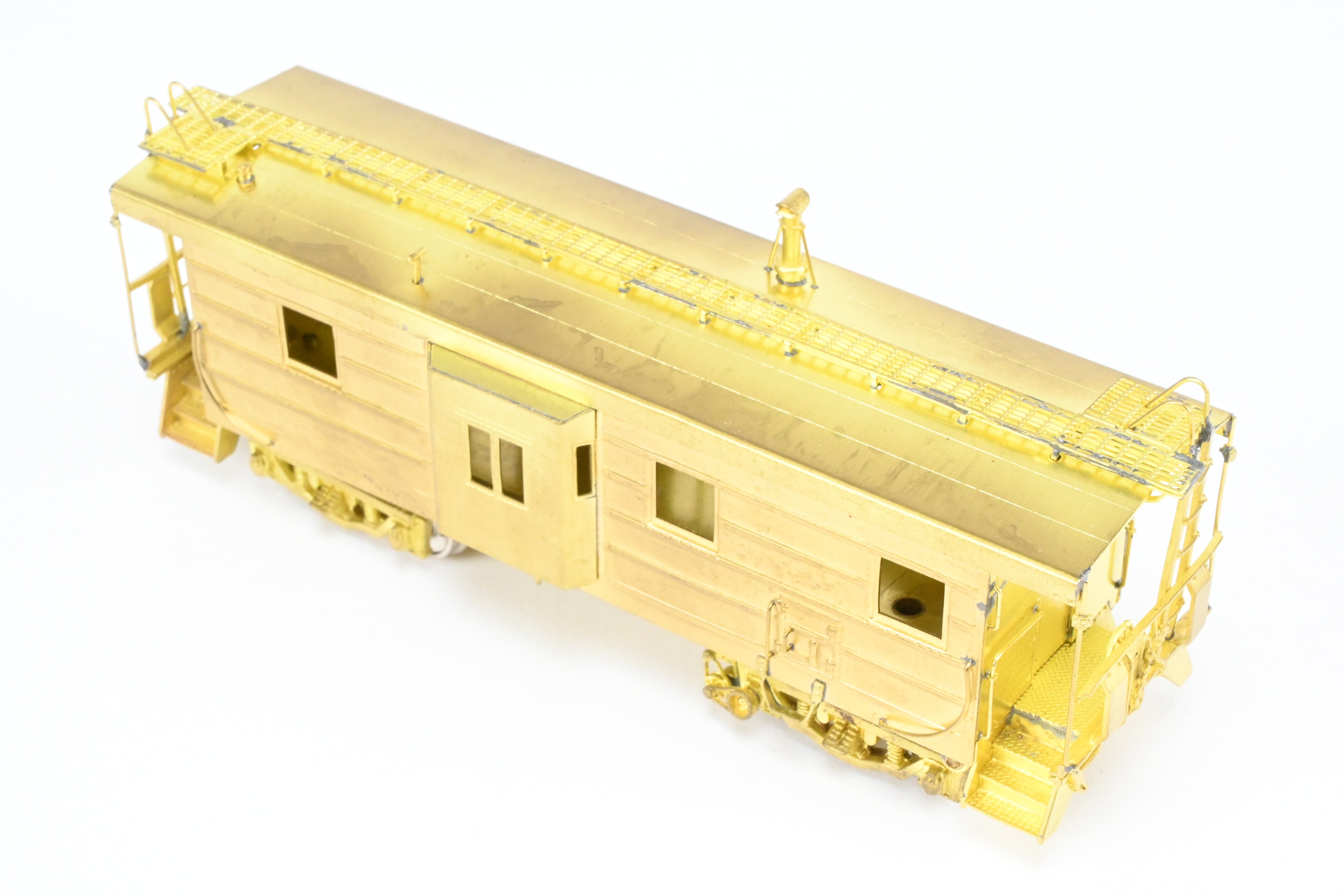 HO Brass OMI MILW - Milwaukee Road Bay Window Caboose with Drop Center Trucks (1991 Run)
