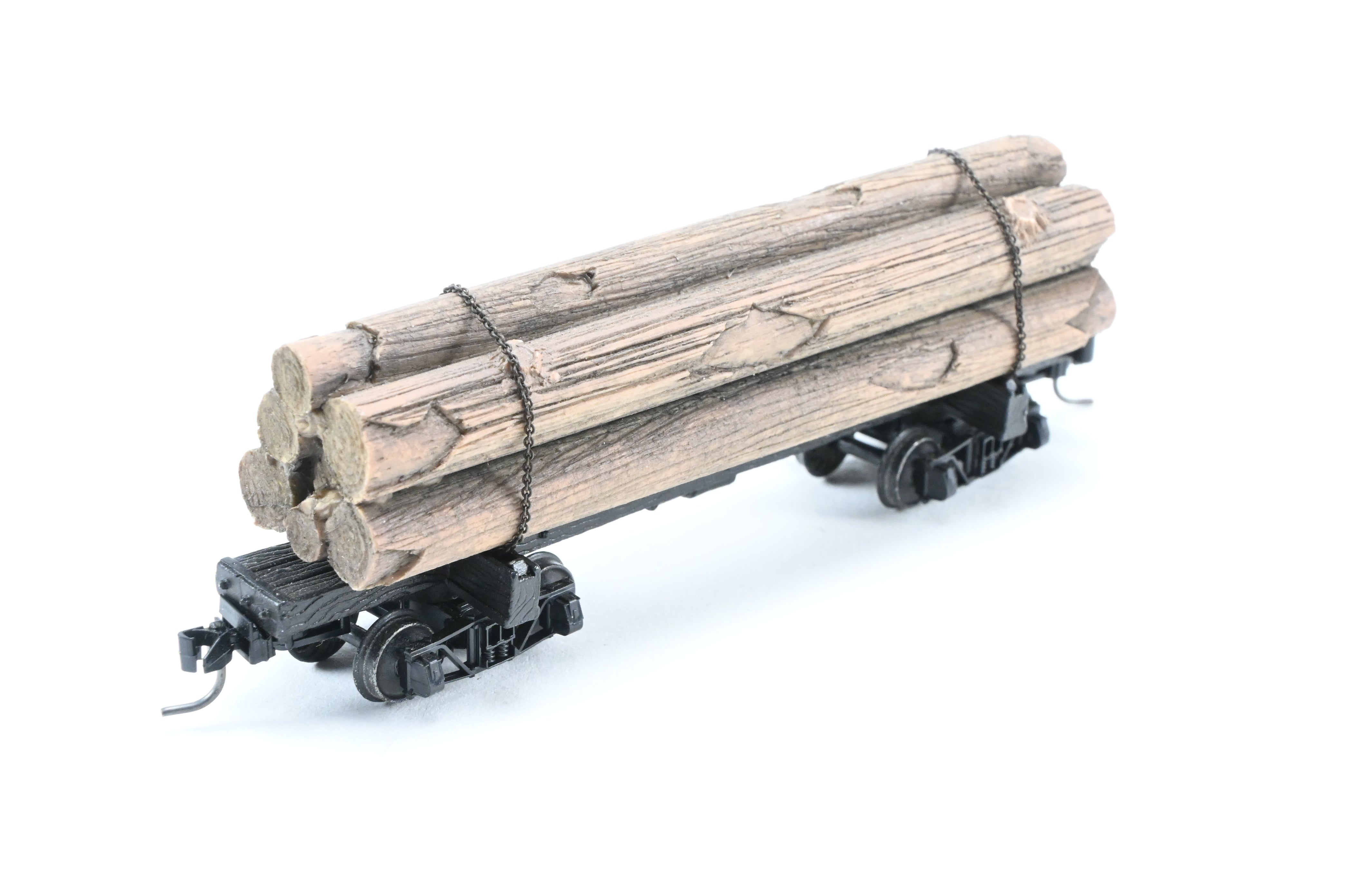 HOn3 Micro-Trains 30’ Factory-Painted Unlettered Skeleton Log Car with Load