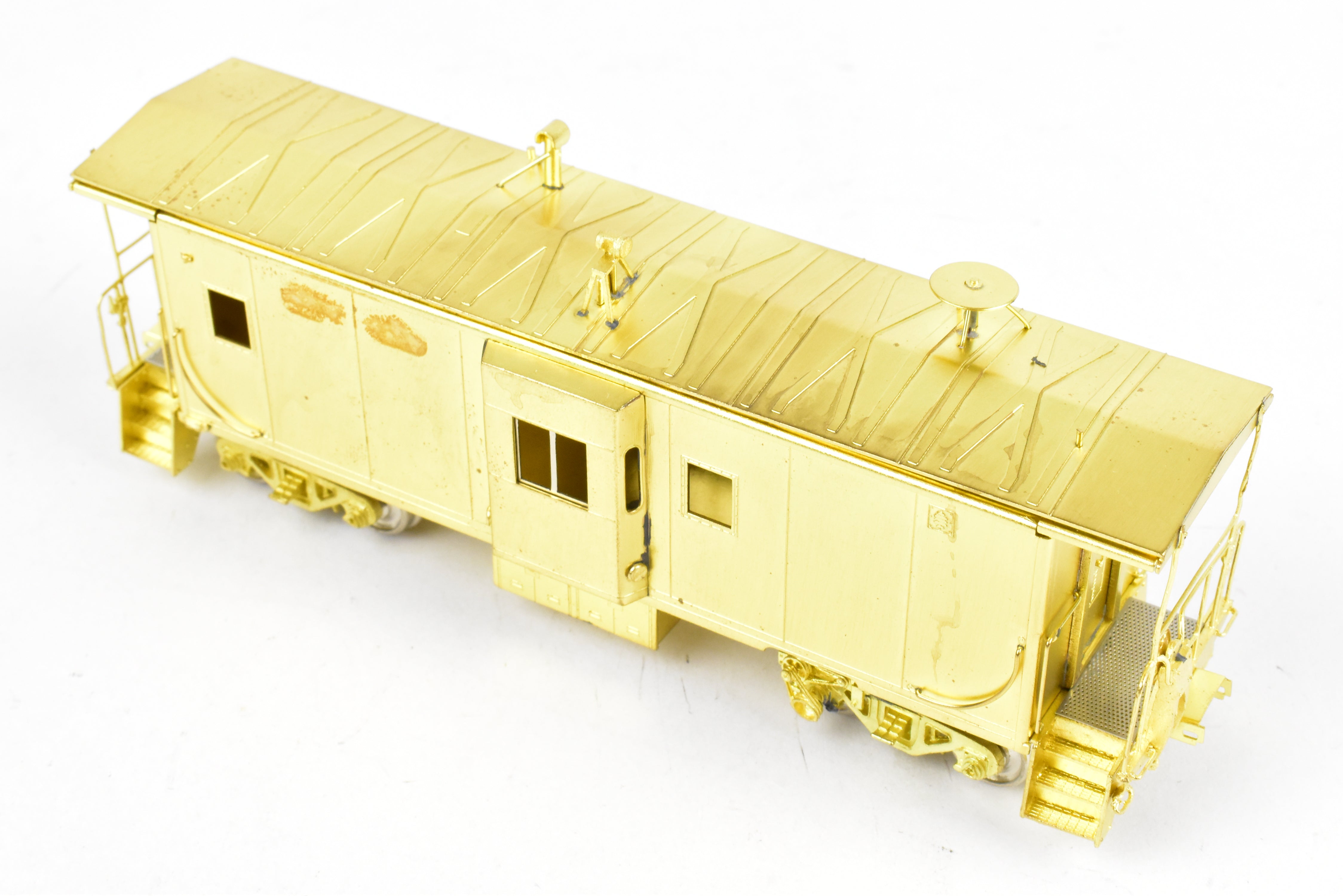 HO Scale Brass Model Train - Overland Models, Inc. (OMI) Southern Pacific (SP) C 50 - 7 Bay Window Caboose in the Series of #4600 - 4659