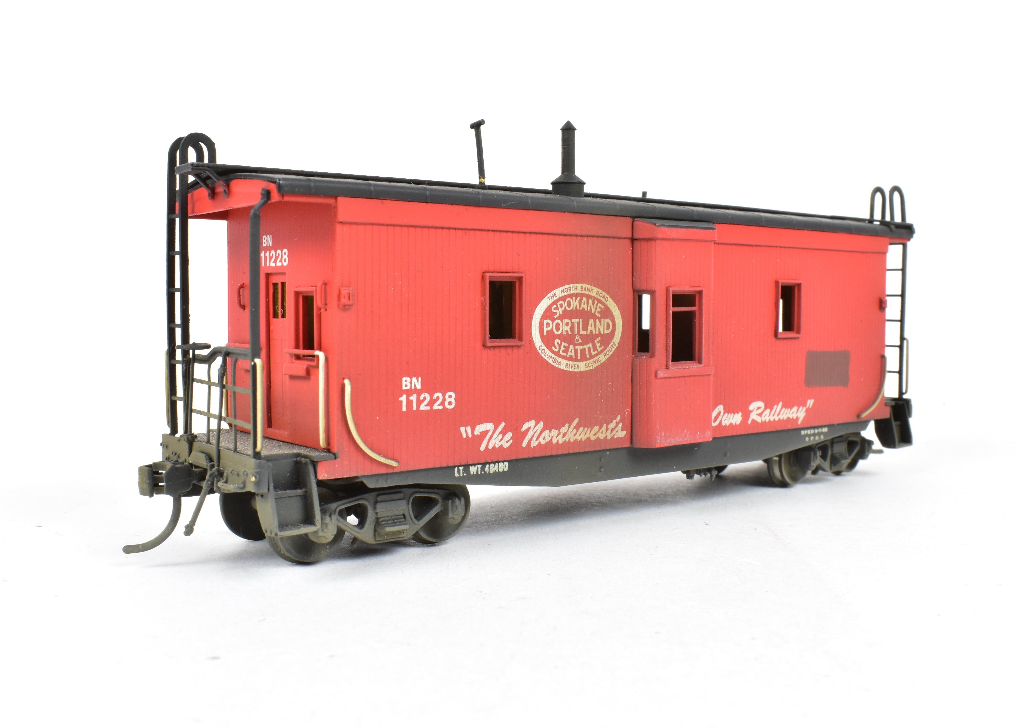 HO Scale Brass OMI - Overland Models, Inc. Model Train Spokane Portland & Seattle Wood Bay Window Caboose with Burlington Northern #11228 Design