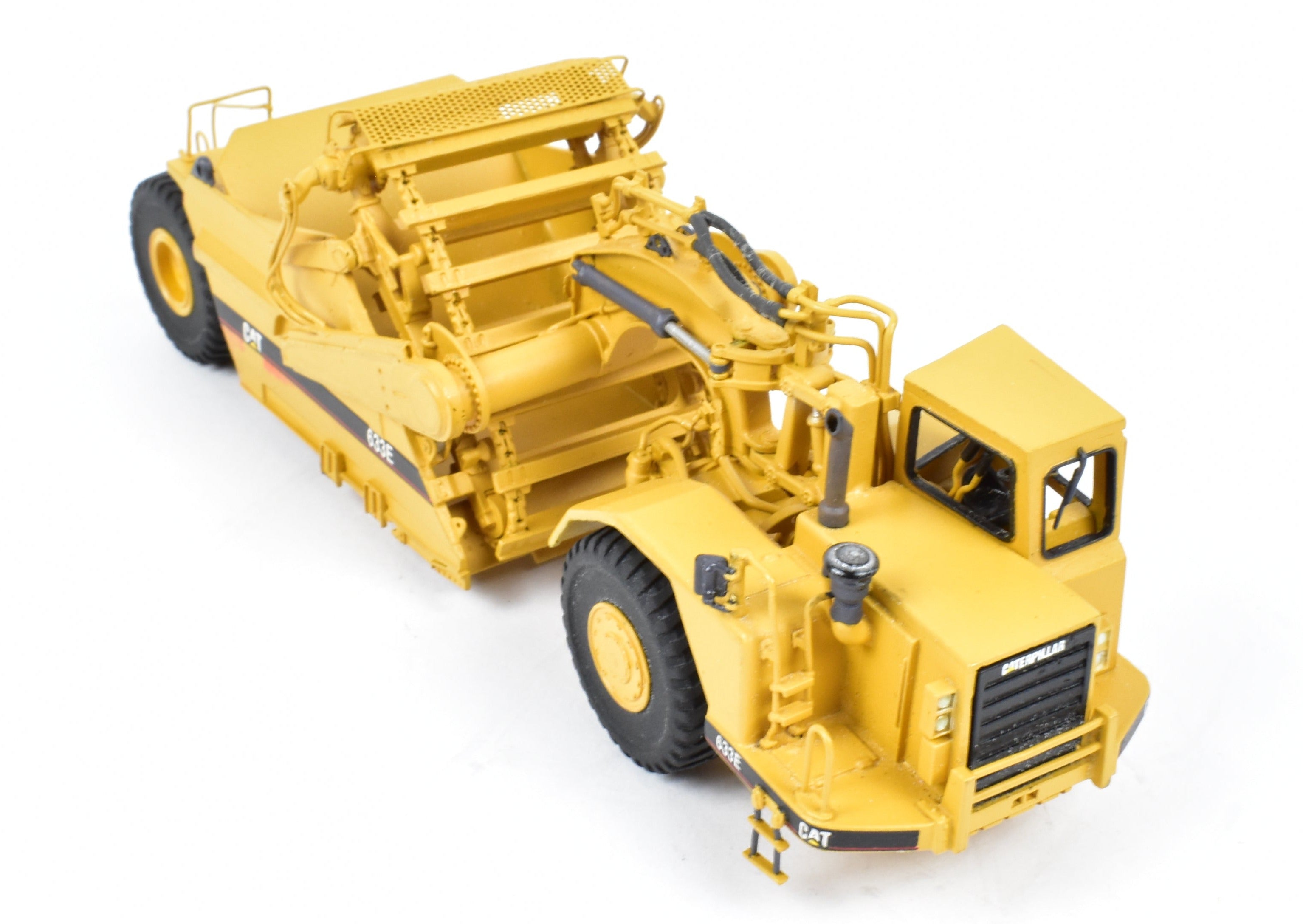 High - Quality HO Scale Brass Construction Model - Factory - Painted Yellow Caterpillar 633E Scraper by CCM Models