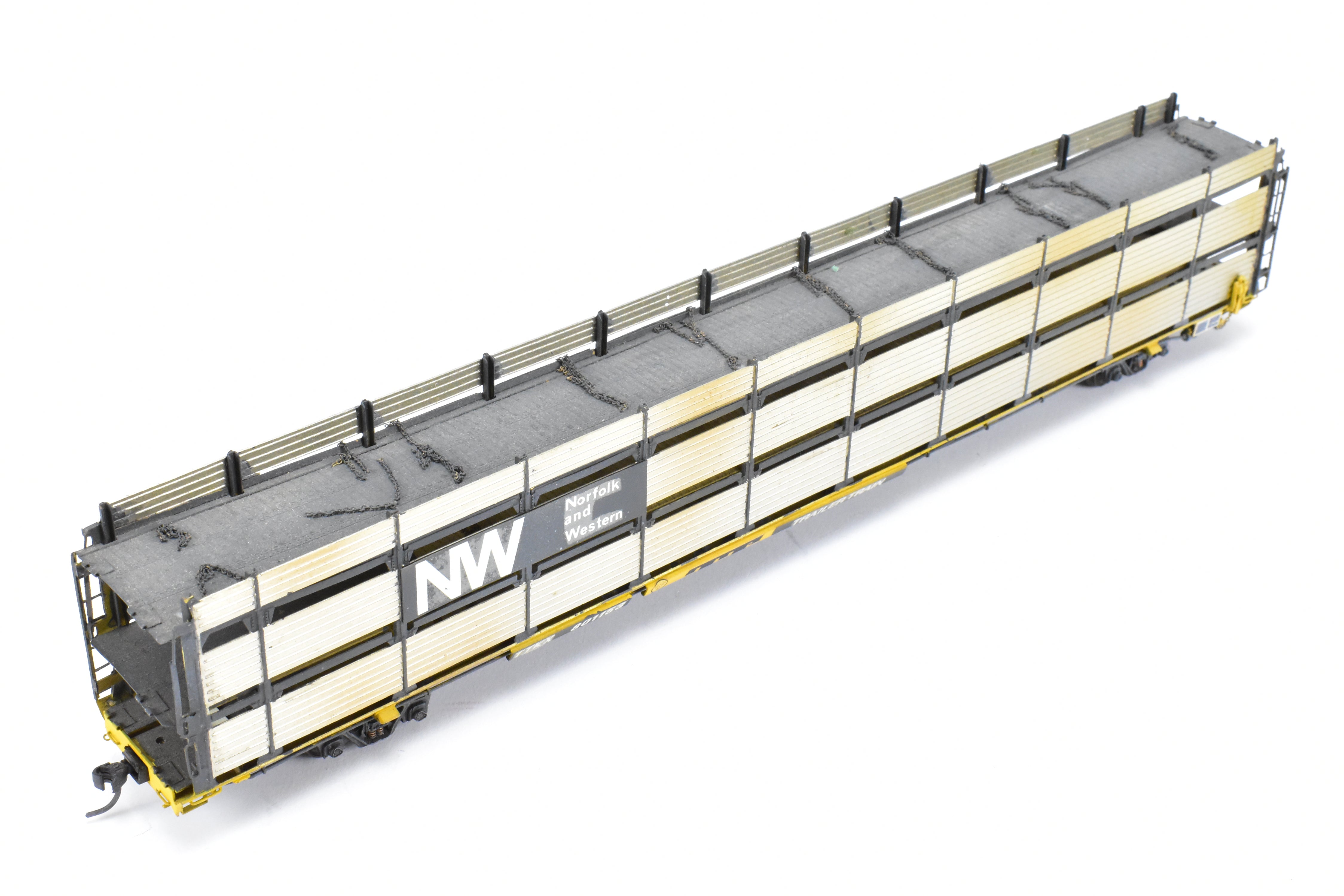 HO Scale Brass Model Tri-Level Auto Rack by Overland Models, Inc. (OMI) - Norfolk & Western Design with Pressed Sides, No Roof, C/P TTKX, and Lightly Weathered Appearance