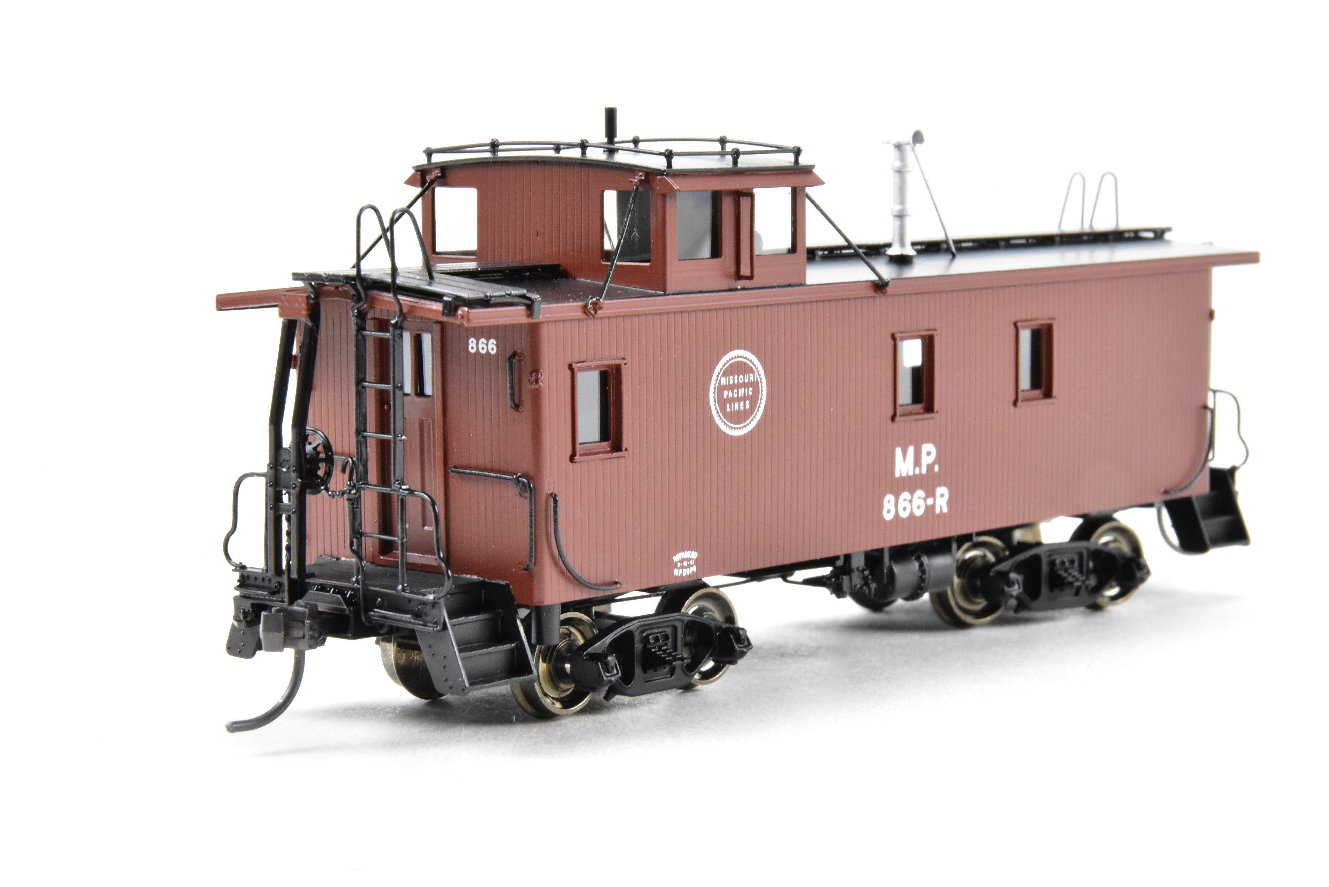 HO Scale Brass Missouri Pacific Wood - Side Caboose Model by Overland Models, Inc. with Angled Braces on Cupola and Antenna on Roof, Model Number #866R