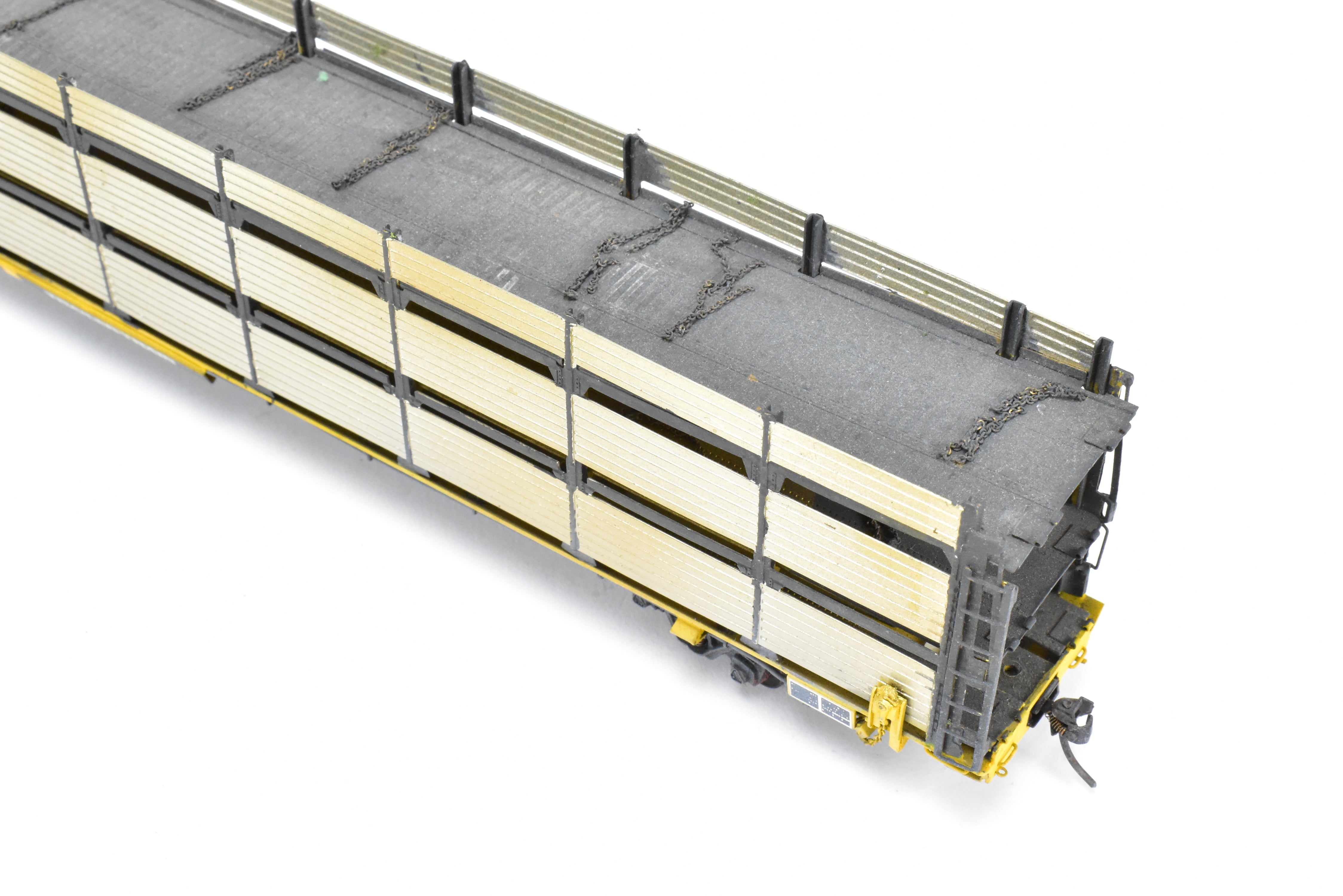 HO Scale Brass Model Tri-Level Auto Rack by Overland Models, Inc. (OMI) - Norfolk & Western Design with Pressed Sides, No Roof, C/P TTKX, and Lightly Weathered Appearance
