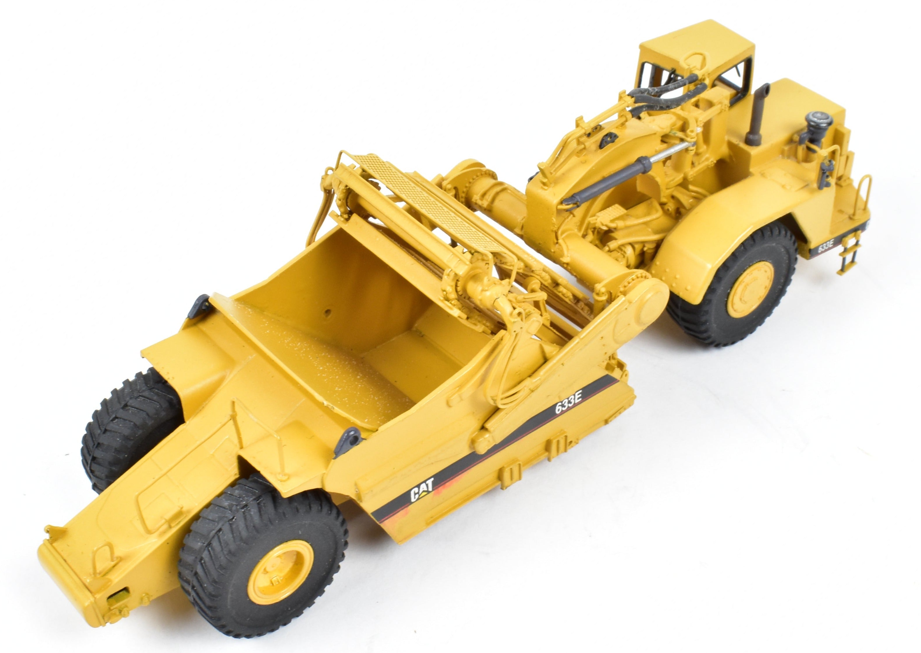 High - Quality HO Scale Brass Construction Model - Factory - Painted Yellow Caterpillar 633E Scraper by CCM Models
