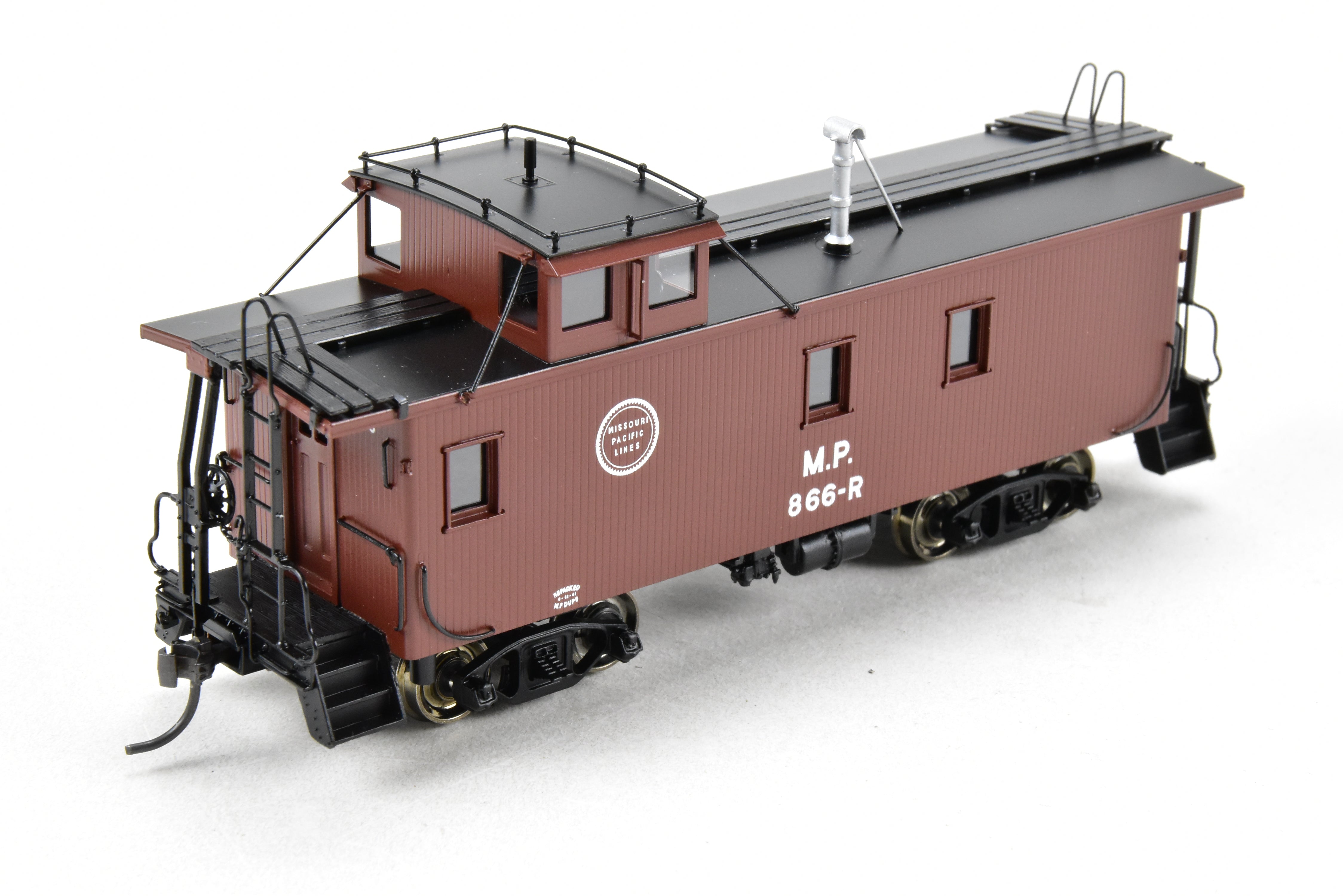 HO Scale Brass Missouri Pacific Wood - Side Caboose Model by Overland Models, Inc. with Angled Braces on Cupola and Antenna on Roof, Model Number #866R