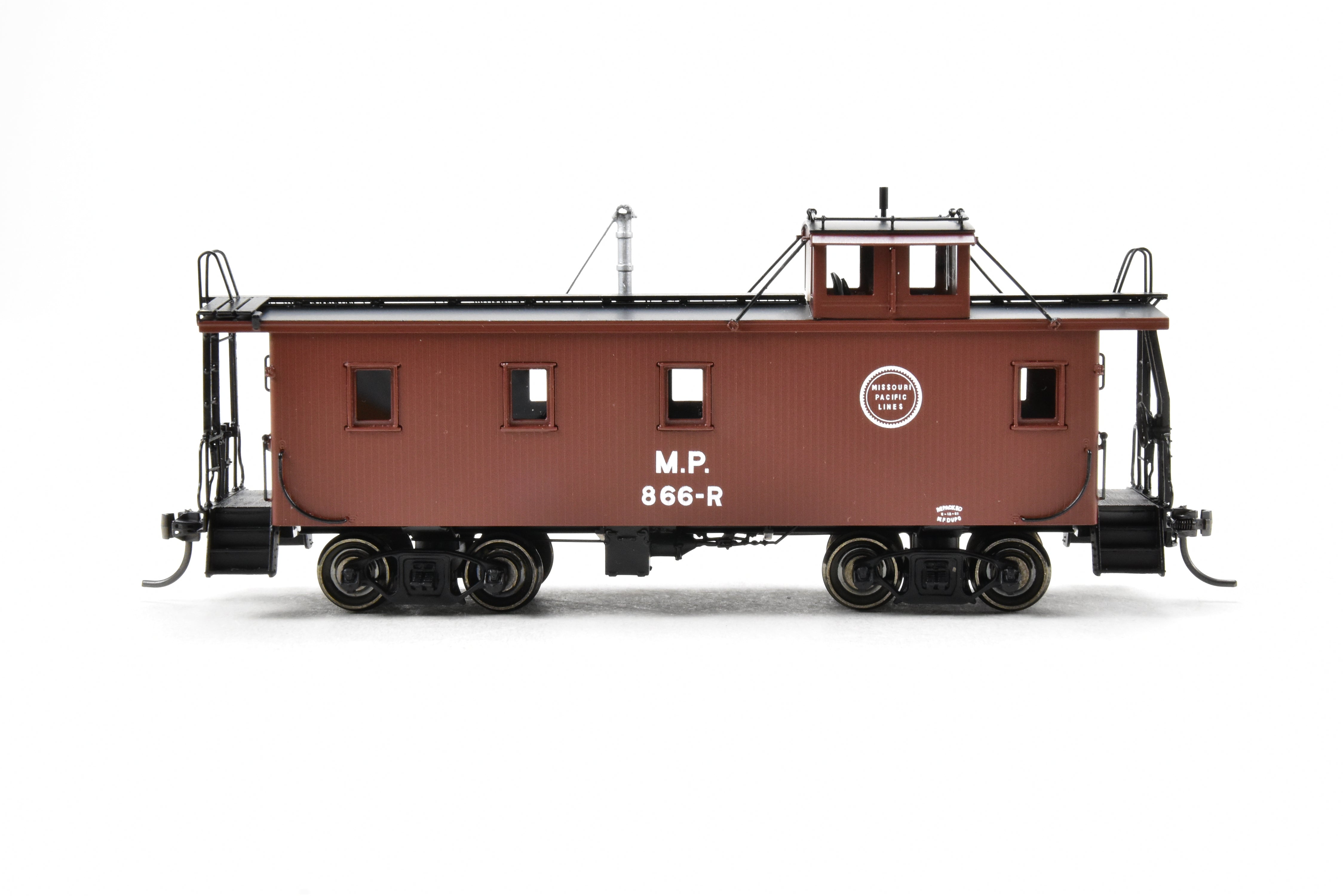 HO Scale Brass Missouri Pacific Wood - Side Caboose Model by Overland Models, Inc. with Angled Braces on Cupola and Antenna on Roof, Model Number #866R