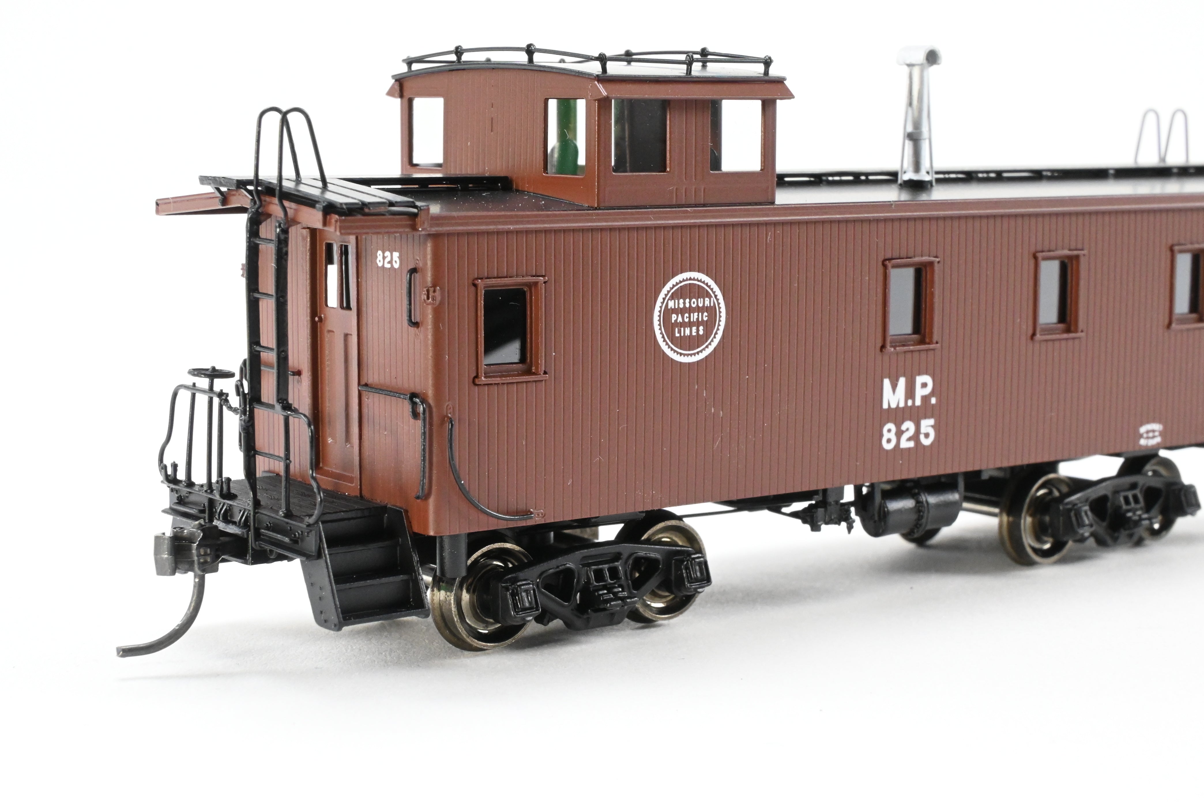 HO Scale Brass Missouri Pacific Wood - Side Caboose F/P #825 by OMI (Overland Models, Inc.)