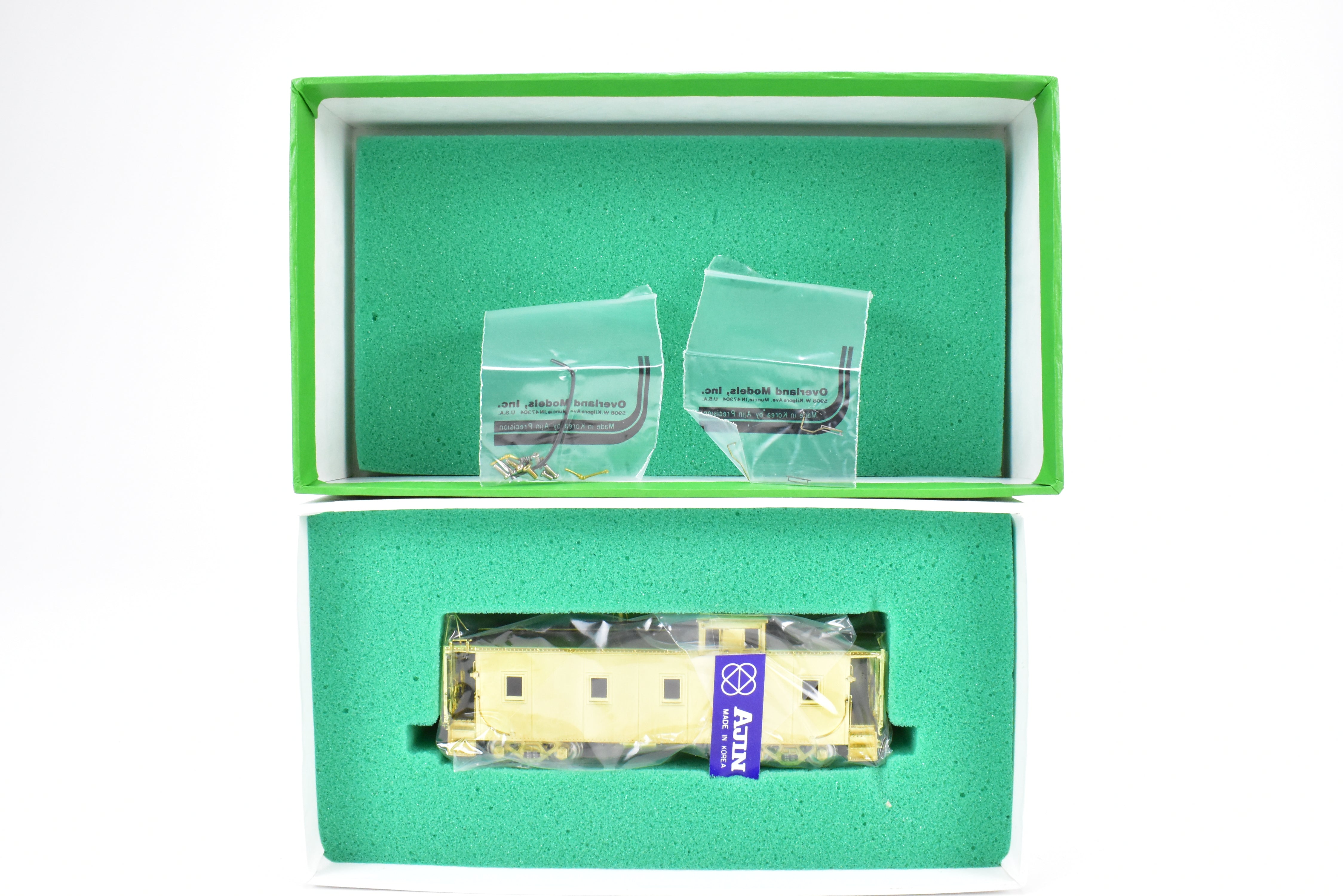 HO Scale Brass OMI - Overland Models, Inc. Missouri Pacific Steel Caboose with Partial Rivets, Brand - New, Product Numbers Ranging from 1051 to 1080