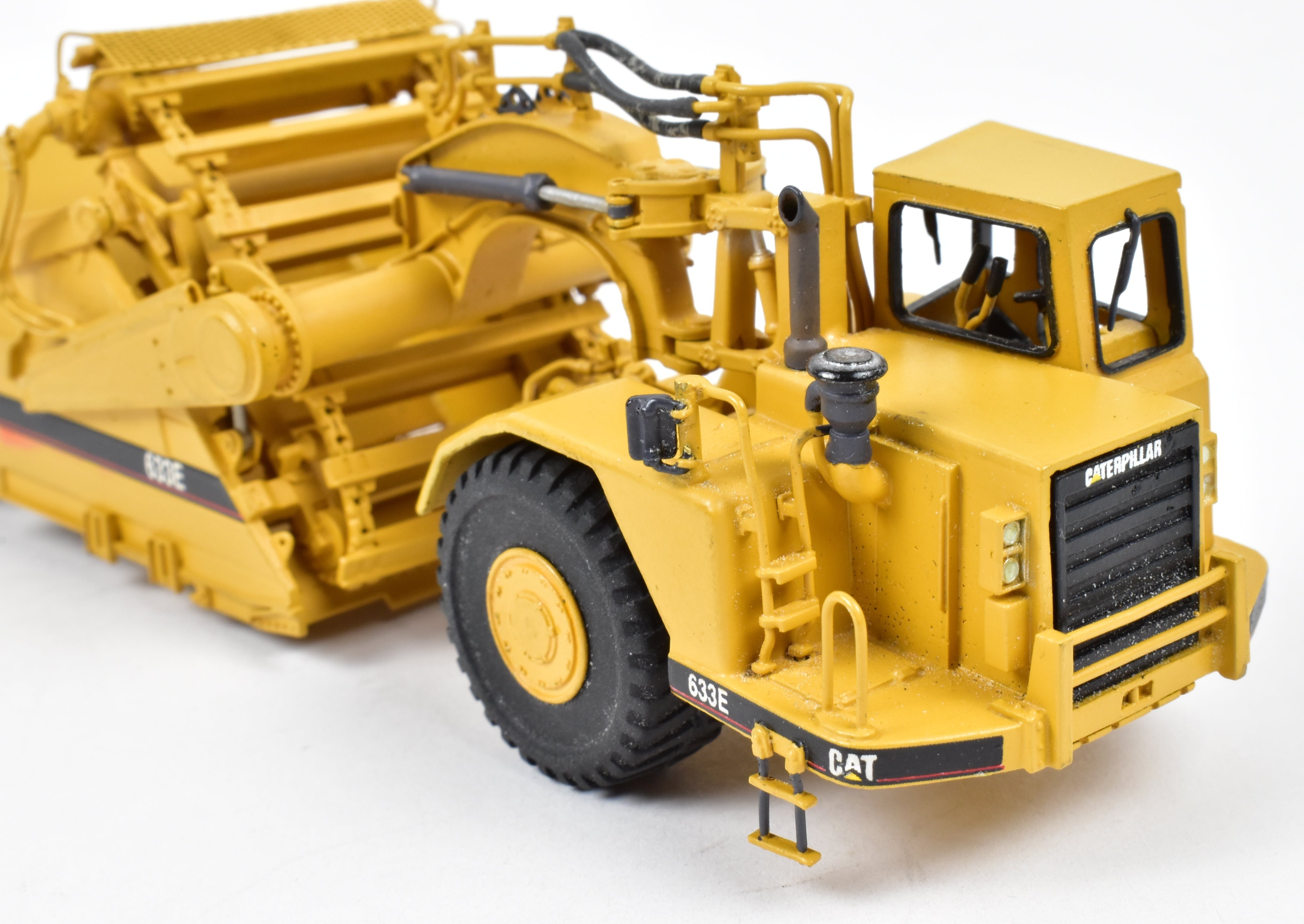 High - Quality HO Scale Brass Construction Model - Factory - Painted Yellow Caterpillar 633E Scraper by CCM Models