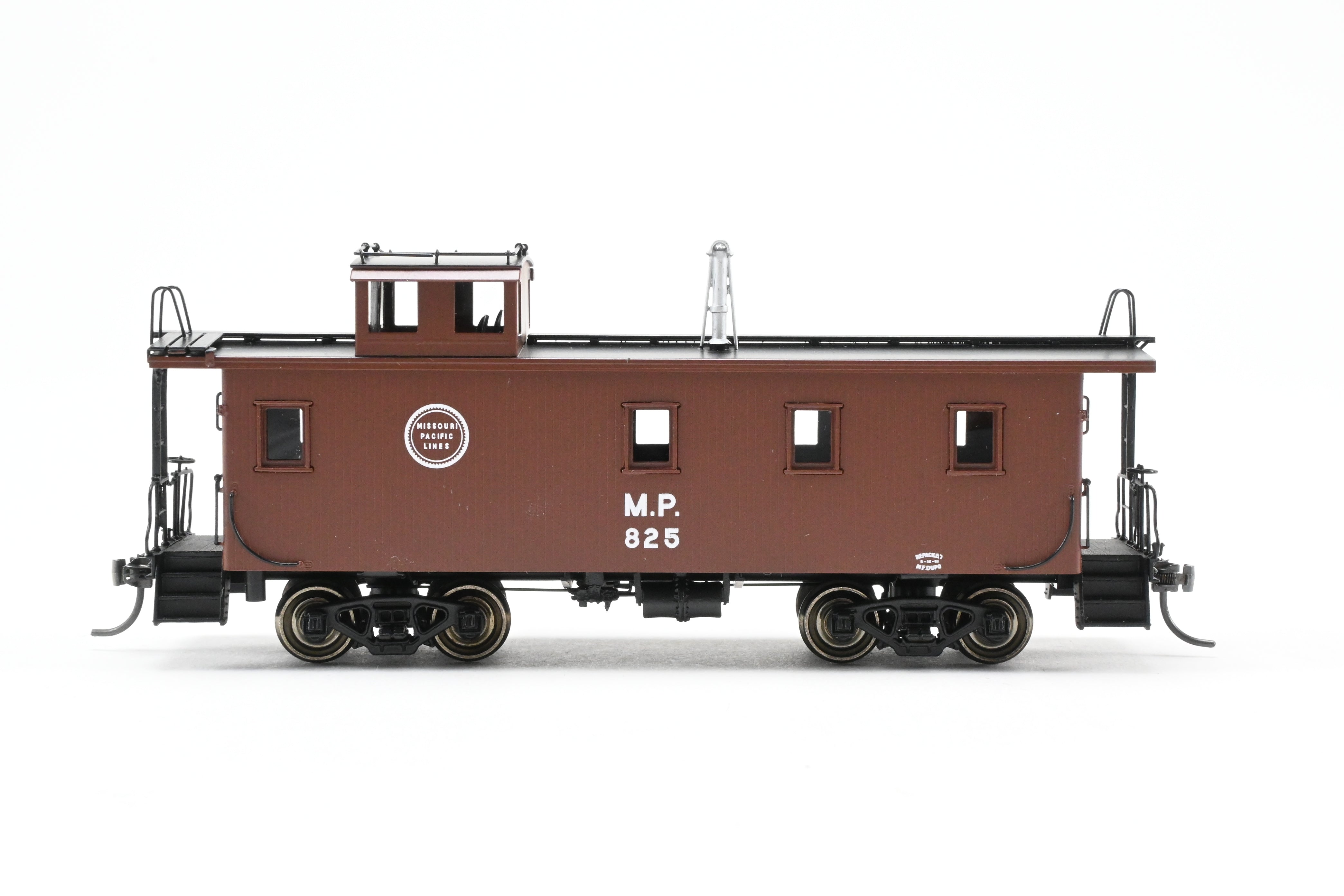 HO Scale Brass Missouri Pacific Wood - Side Caboose F/P #825 by OMI (Overland Models, Inc.)