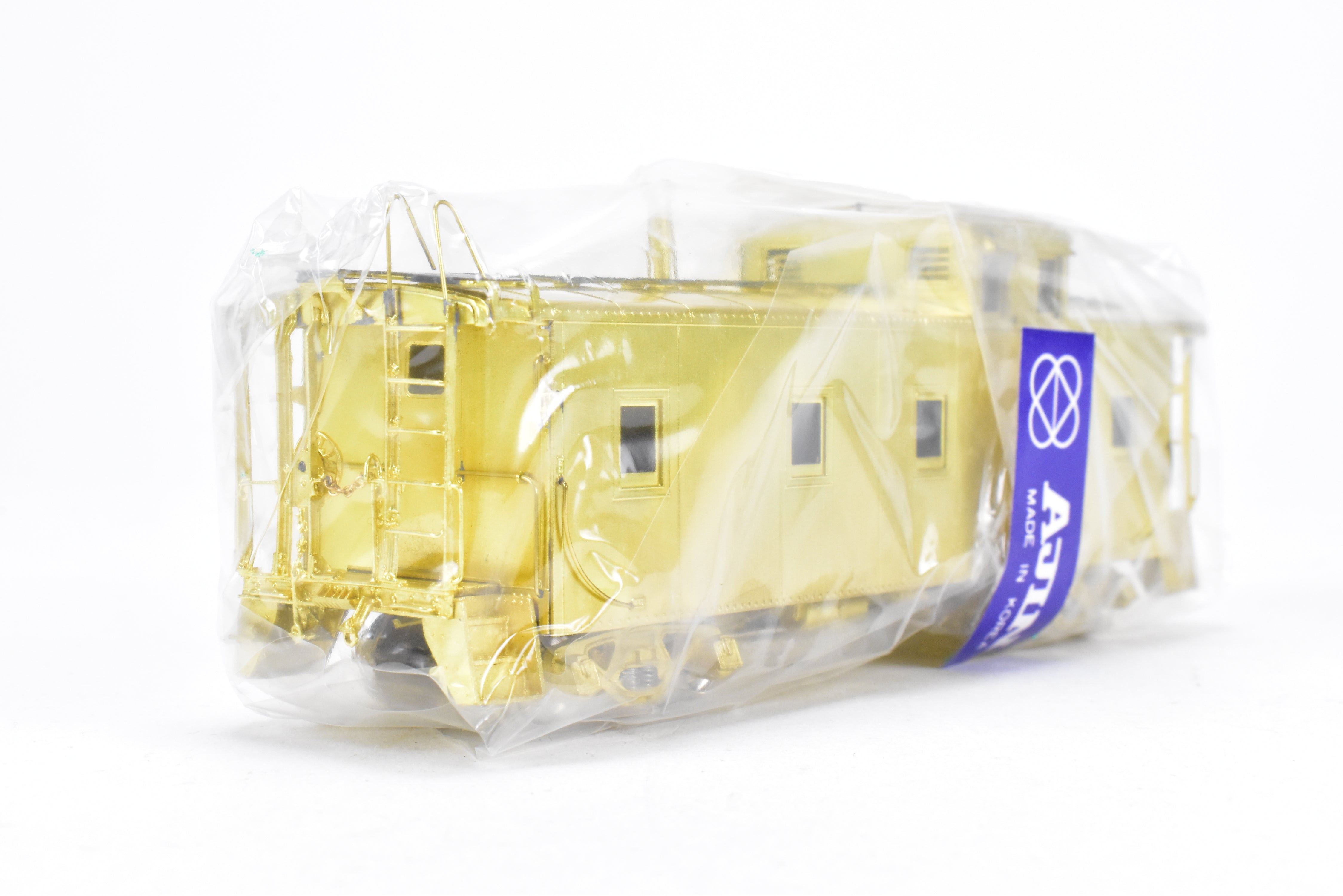 HO Scale Brass OMI - Overland Models, Inc. Missouri Pacific Steel Caboose with Partial Rivets, Brand - New, Product Numbers Ranging from 1051 to 1080