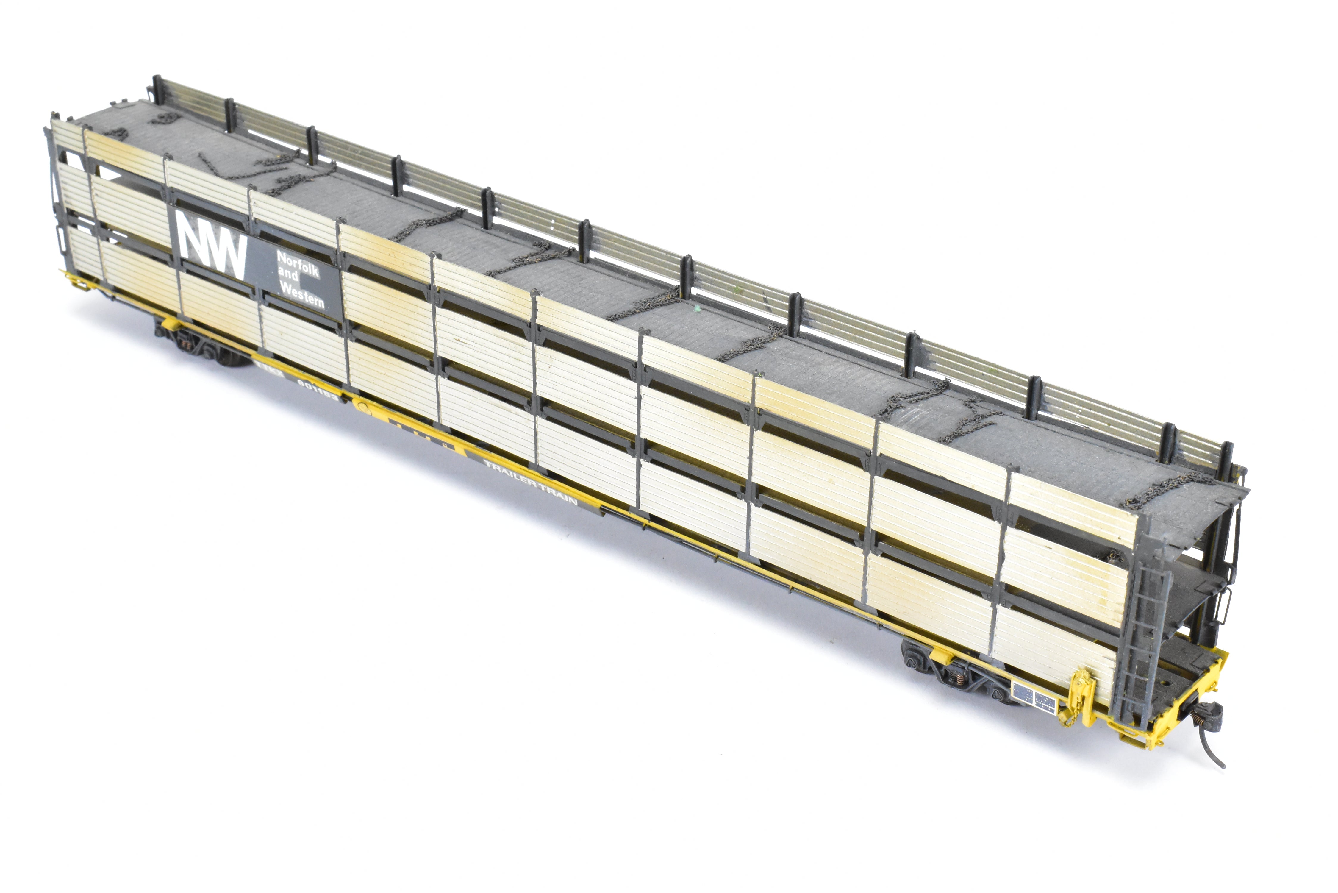 HO Scale Brass Model Tri-Level Auto Rack by Overland Models, Inc. (OMI) - Norfolk & Western Design with Pressed Sides, No Roof, C/P TTKX, and Lightly Weathered Appearance