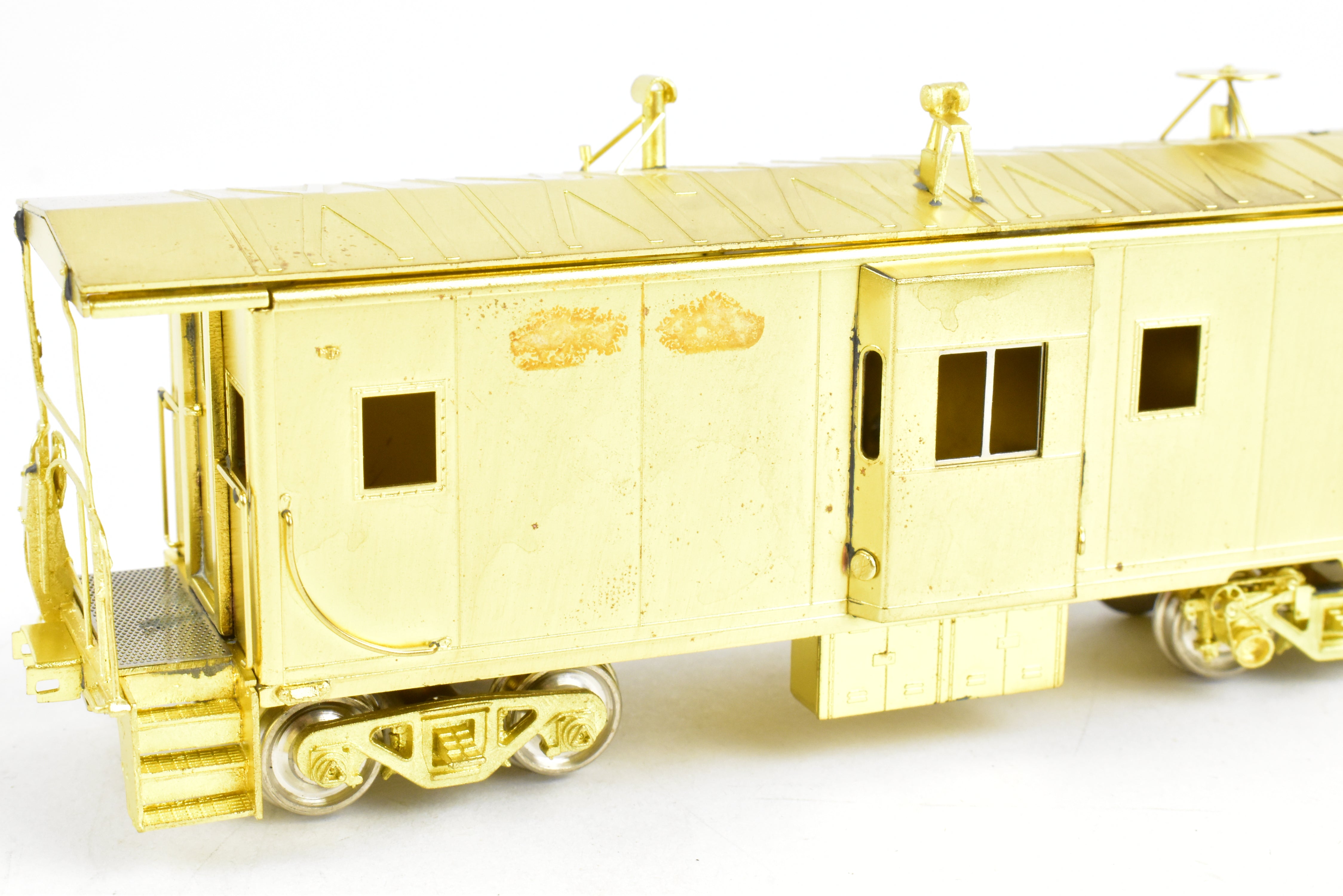 HO Scale Brass Model Train - Overland Models, Inc. (OMI) Southern Pacific (SP) C 50 - 7 Bay Window Caboose in the Series of #4600 - 4659