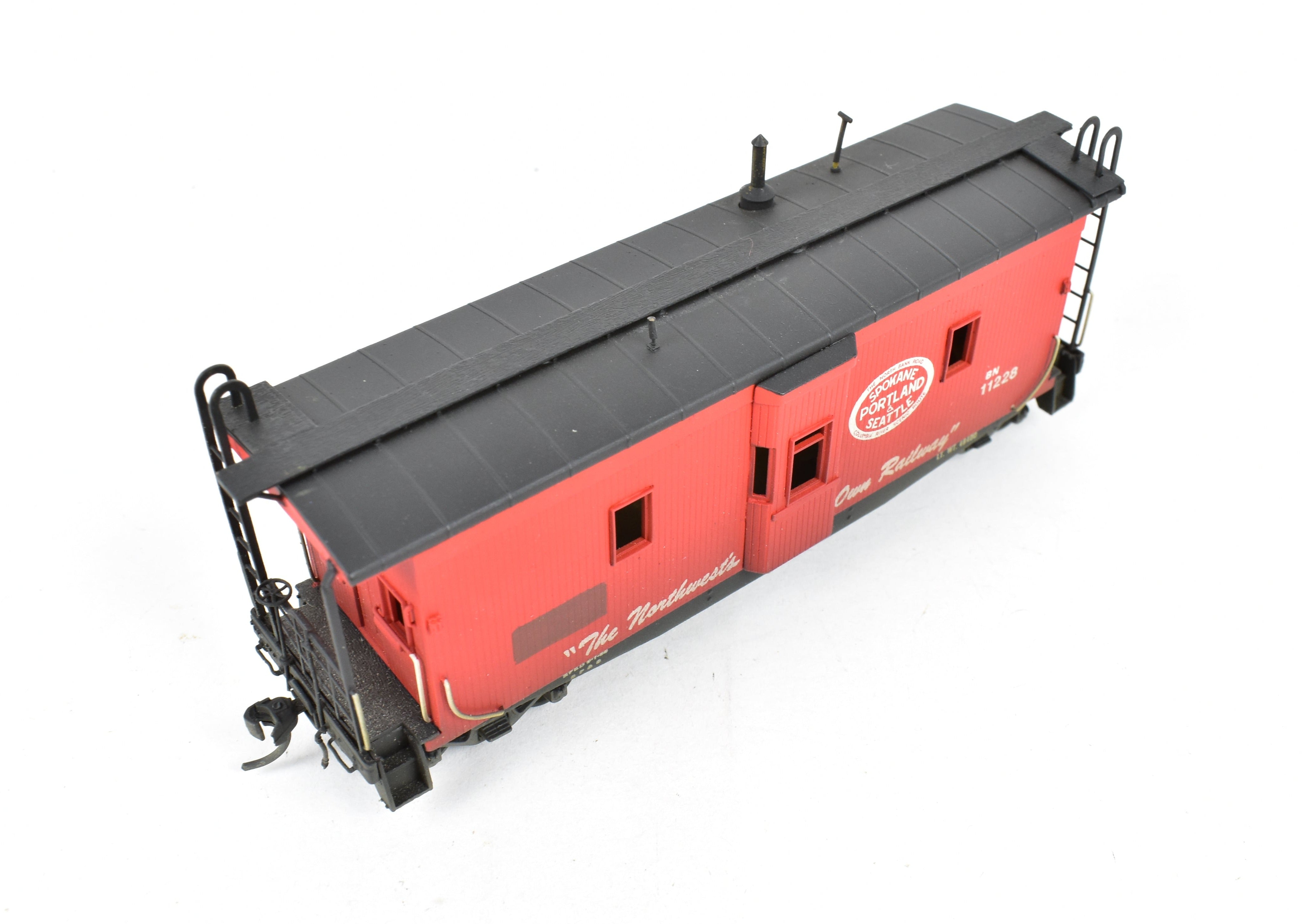 HO Scale Brass OMI - Overland Models, Inc. Model Train Spokane Portland & Seattle Wood Bay Window Caboose with Burlington Northern #11228 Design
