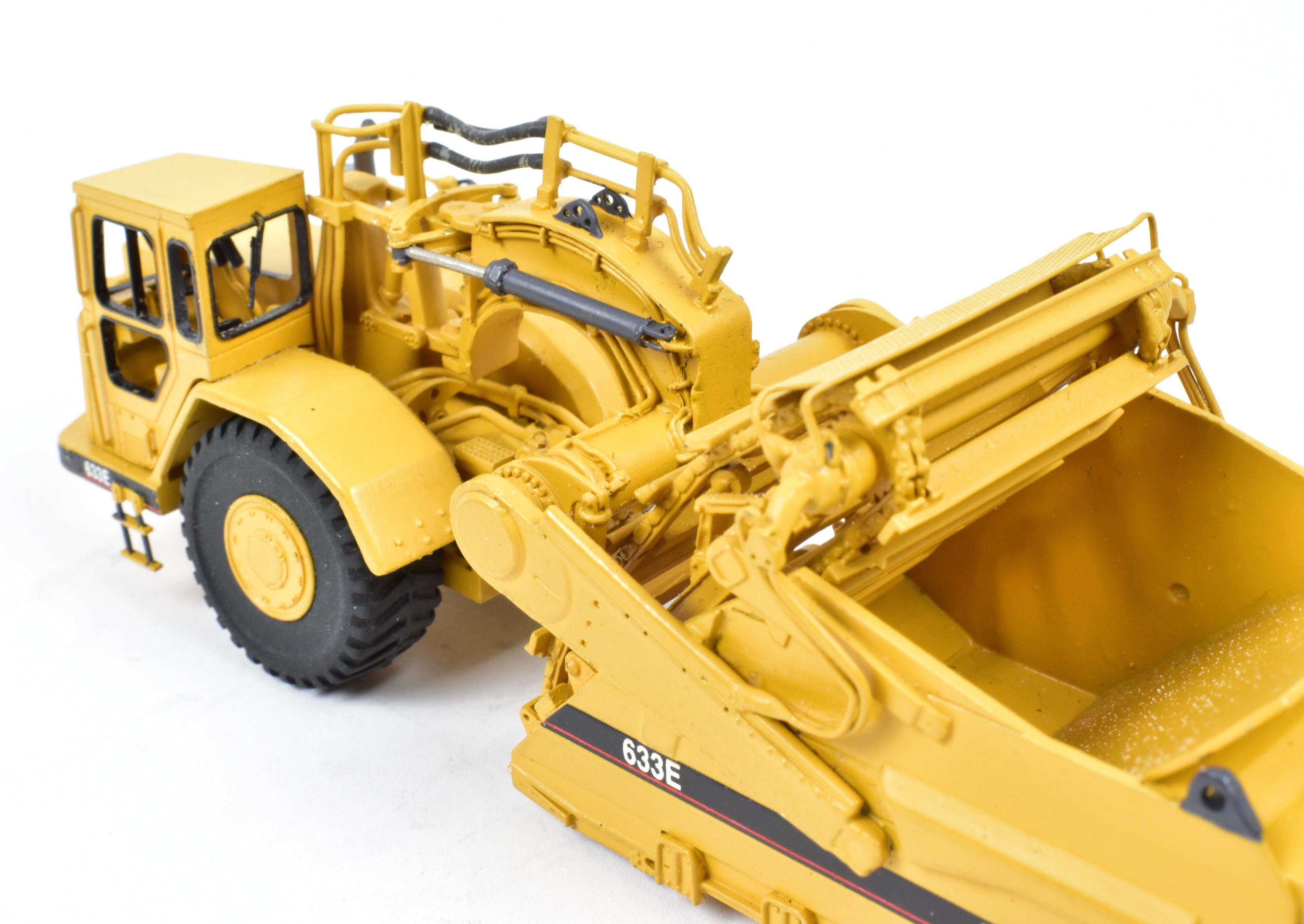 High - Quality HO Scale Brass Construction Model - Factory - Painted Yellow Caterpillar 633E Scraper by CCM Models