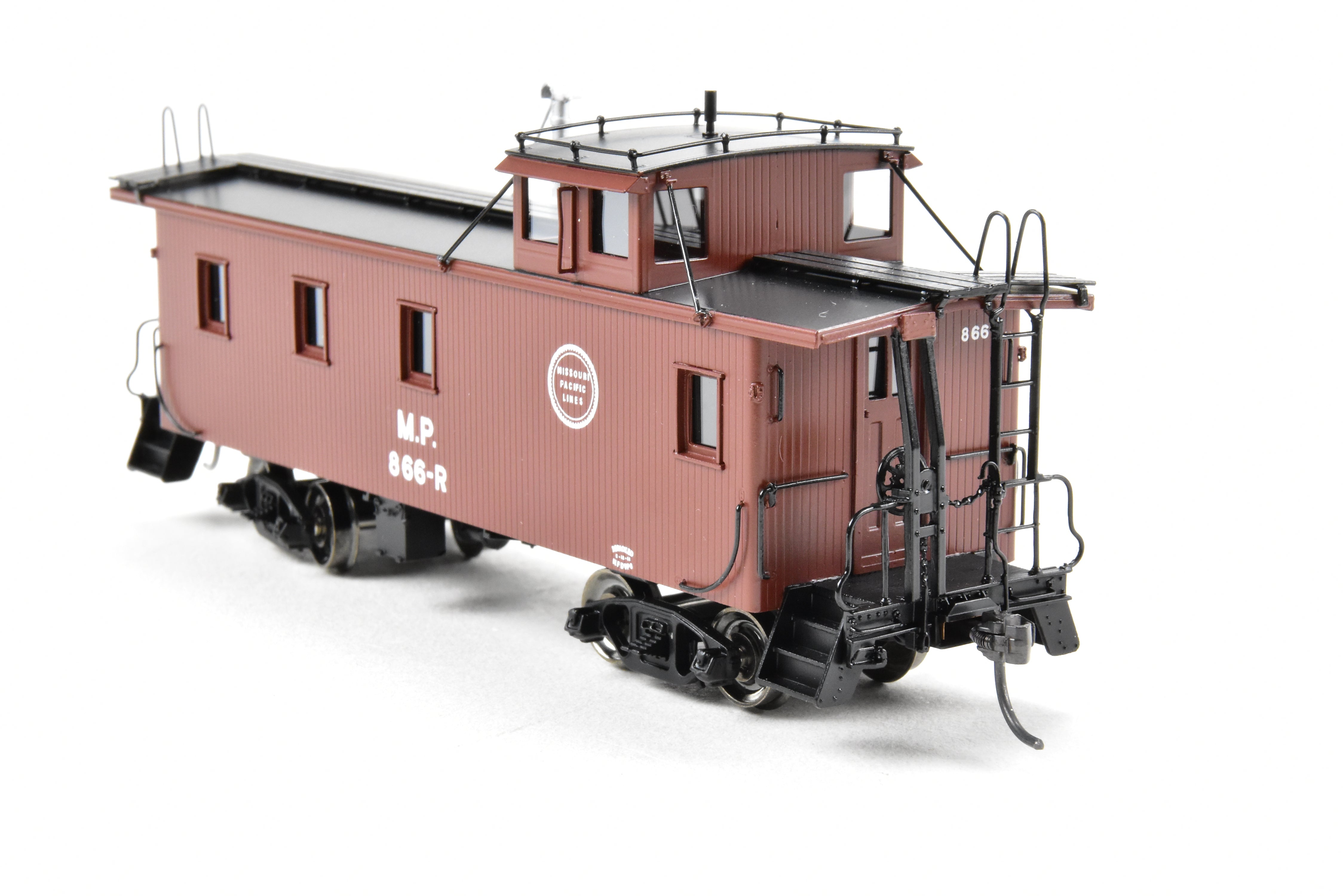 HO Scale Brass Missouri Pacific Wood - Side Caboose Model by Overland Models, Inc. with Angled Braces on Cupola and Antenna on Roof, Model Number #866R