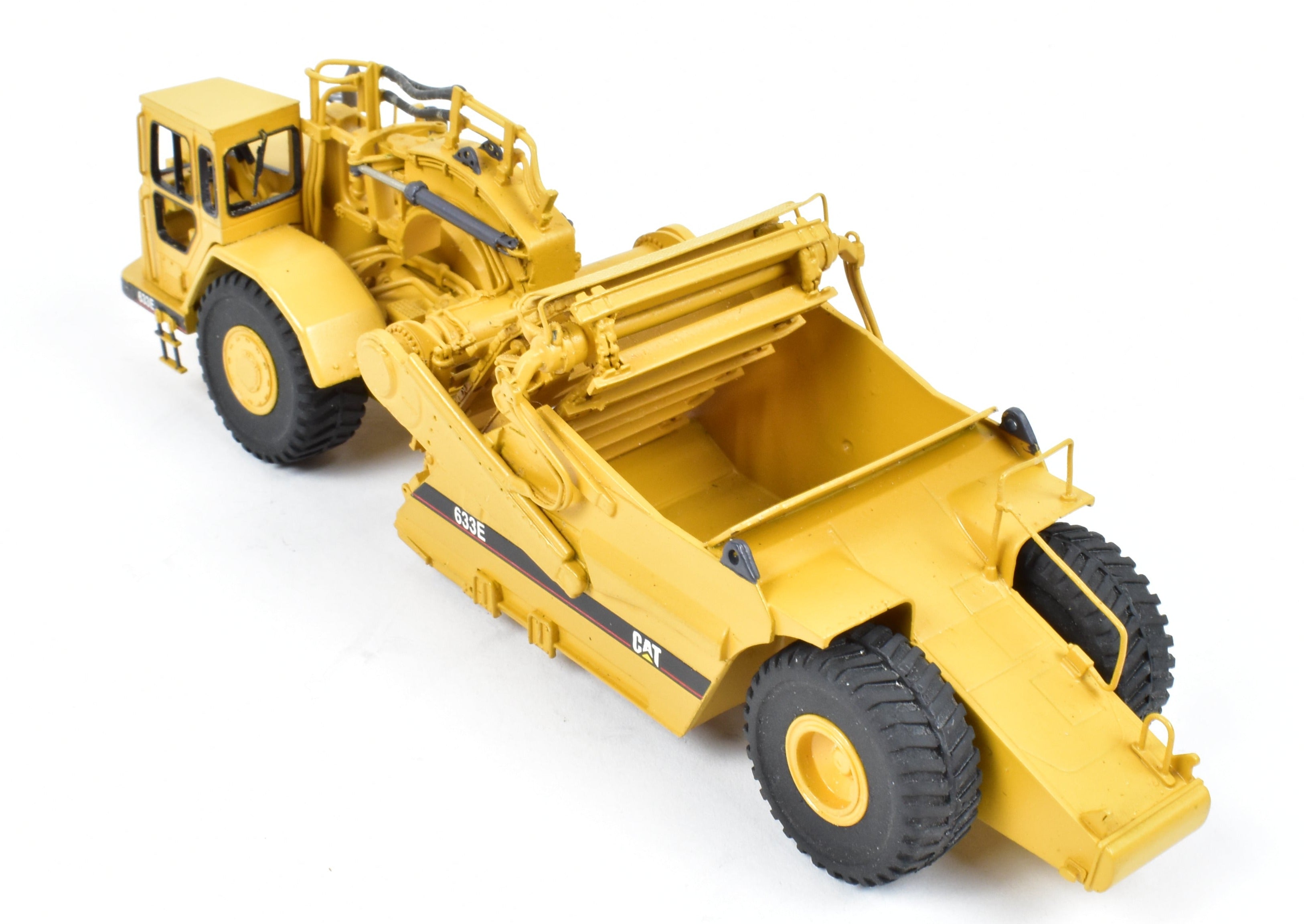 High - Quality HO Scale Brass Construction Model - Factory - Painted Yellow Caterpillar 633E Scraper by CCM Models