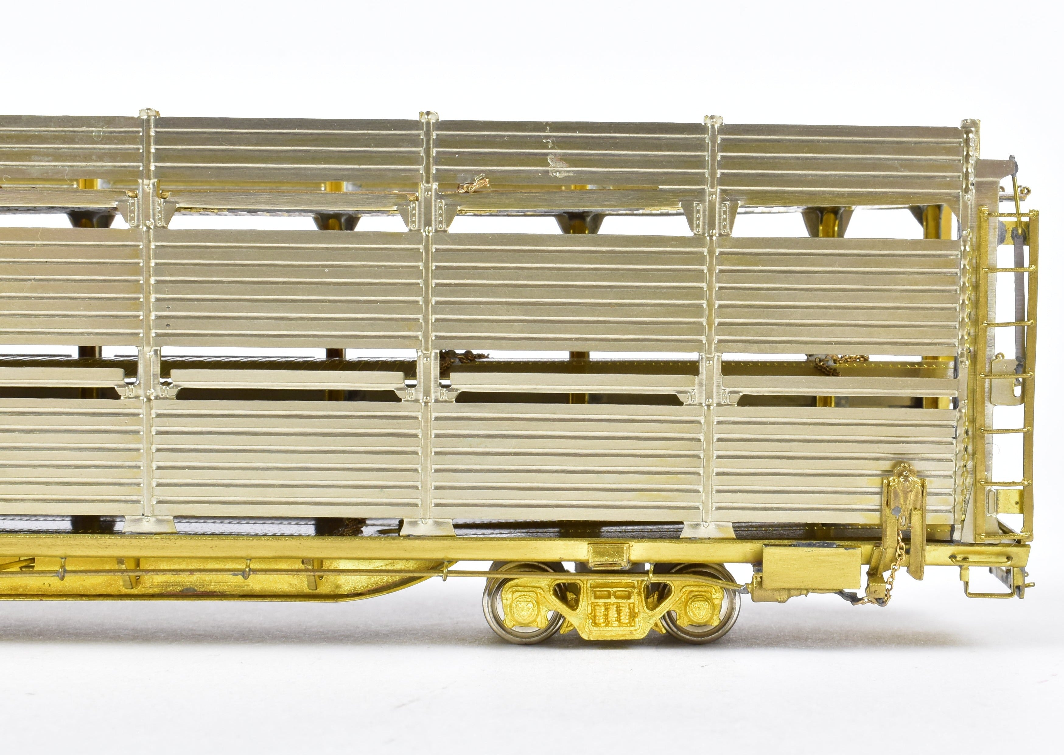 HO Scale Brass Tri - Level Auto Rack Model by Overland Models, Inc. (OMI) for Various Railroads like ATSF, BN, CR, N&W, and SP with Pressed Sides and Optional Roof