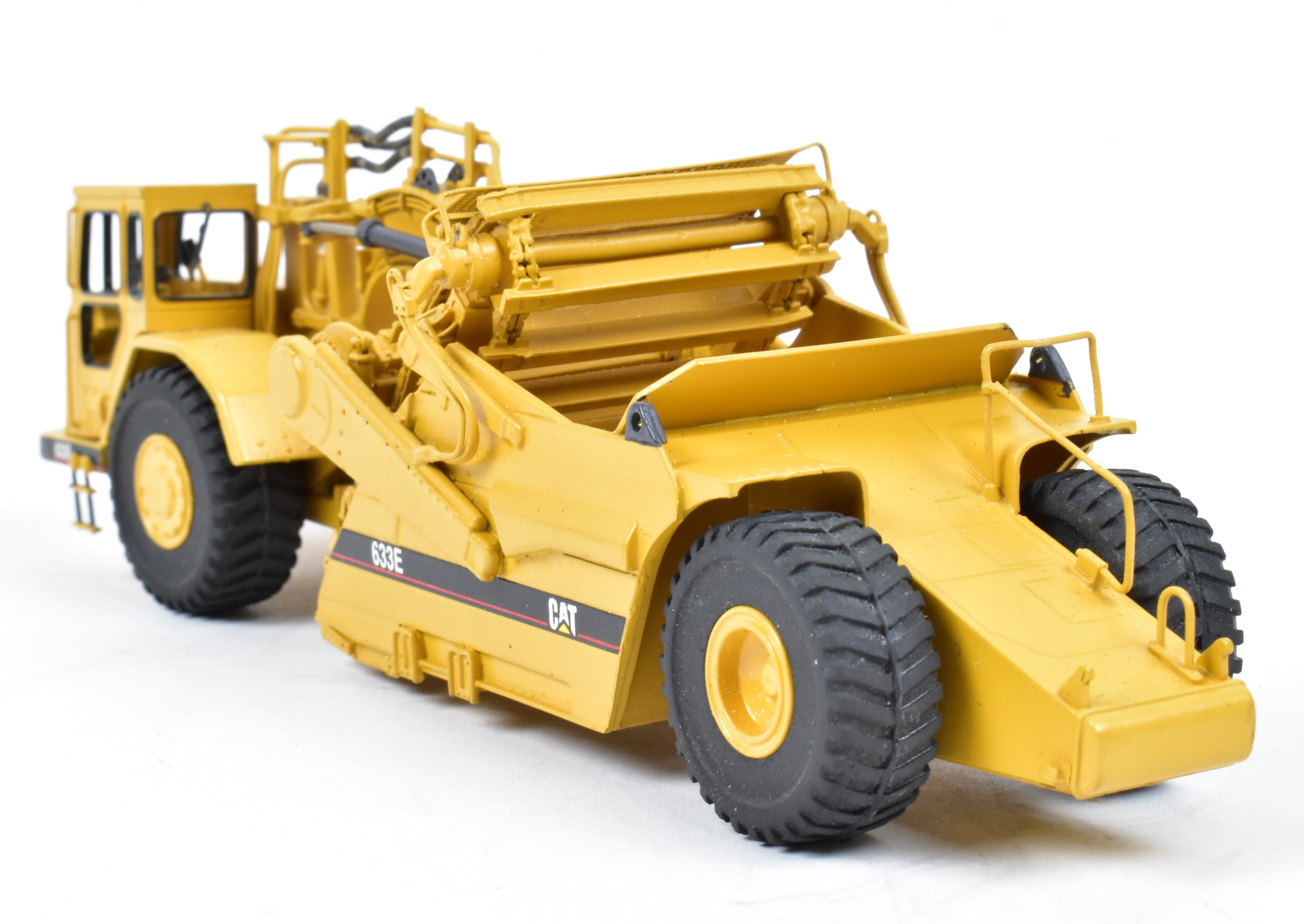 High - Quality HO Scale Brass Construction Model - Factory - Painted Yellow Caterpillar 633E Scraper by CCM Models