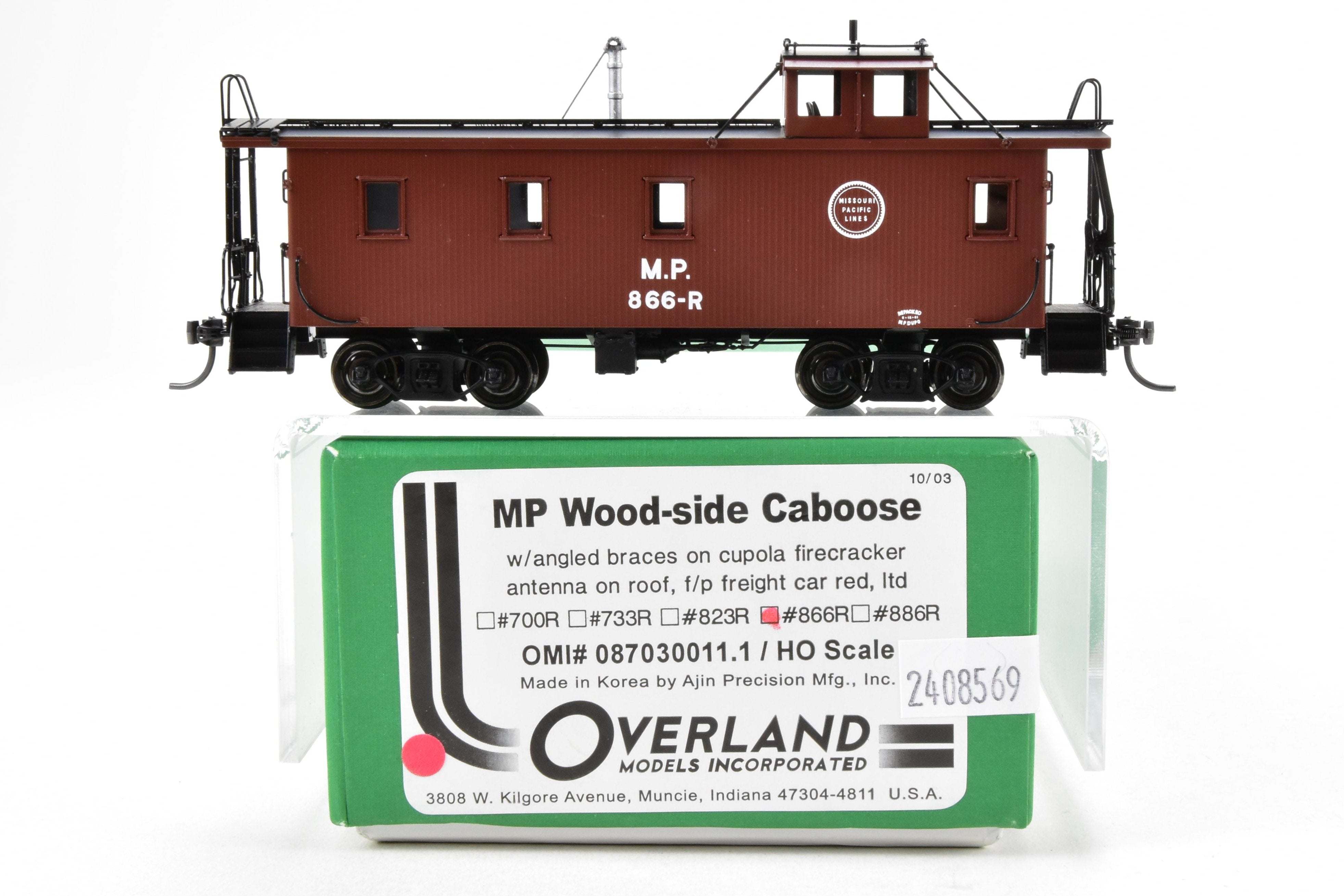 HO Scale Brass Missouri Pacific Wood - Side Caboose Model by Overland Models, Inc. with Angled Braces on Cupola and Antenna on Roof, Model Number #866R