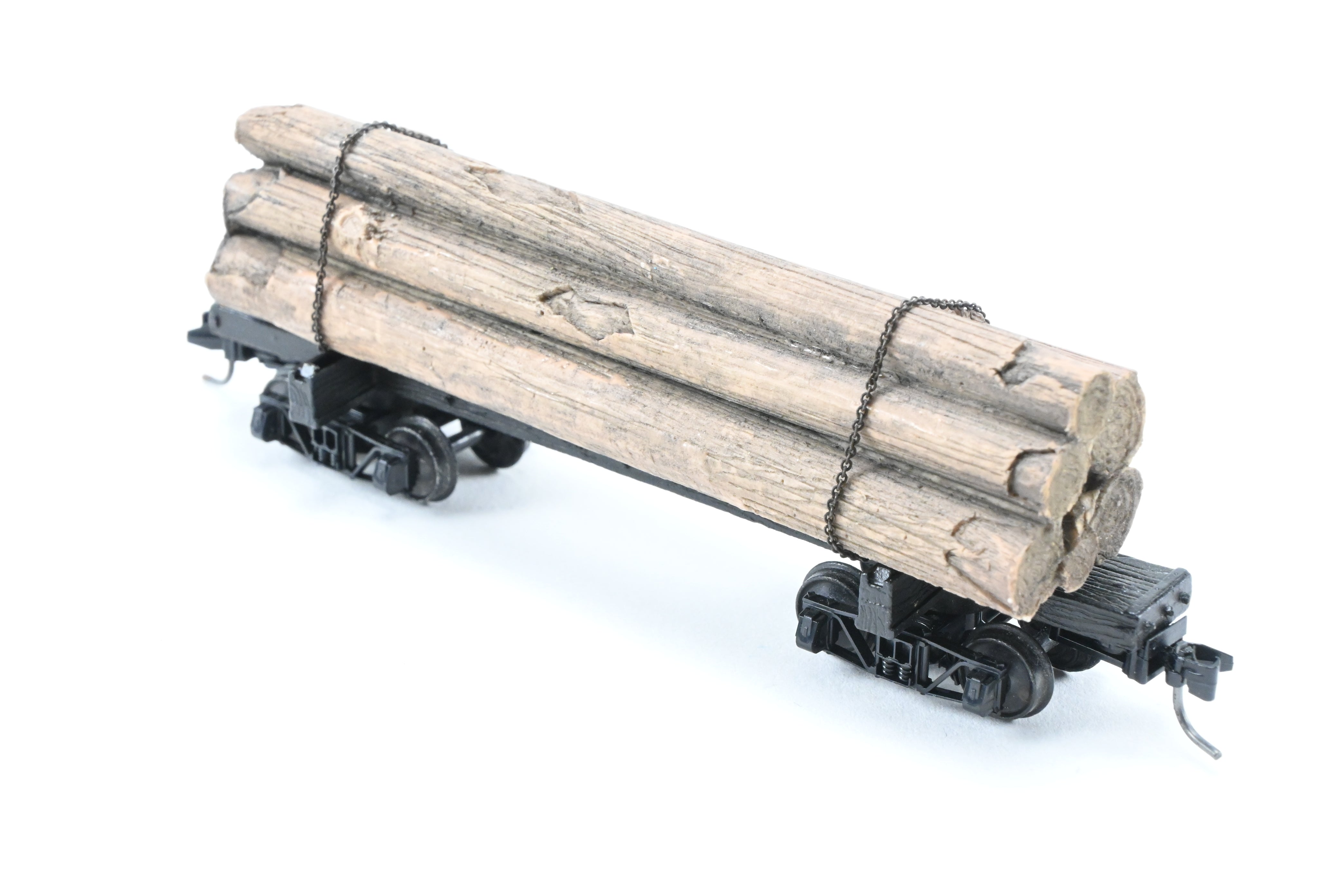 HOn3 Micro-Trains 30’ Factory-Painted Unlettered Skeleton Log Car with Load