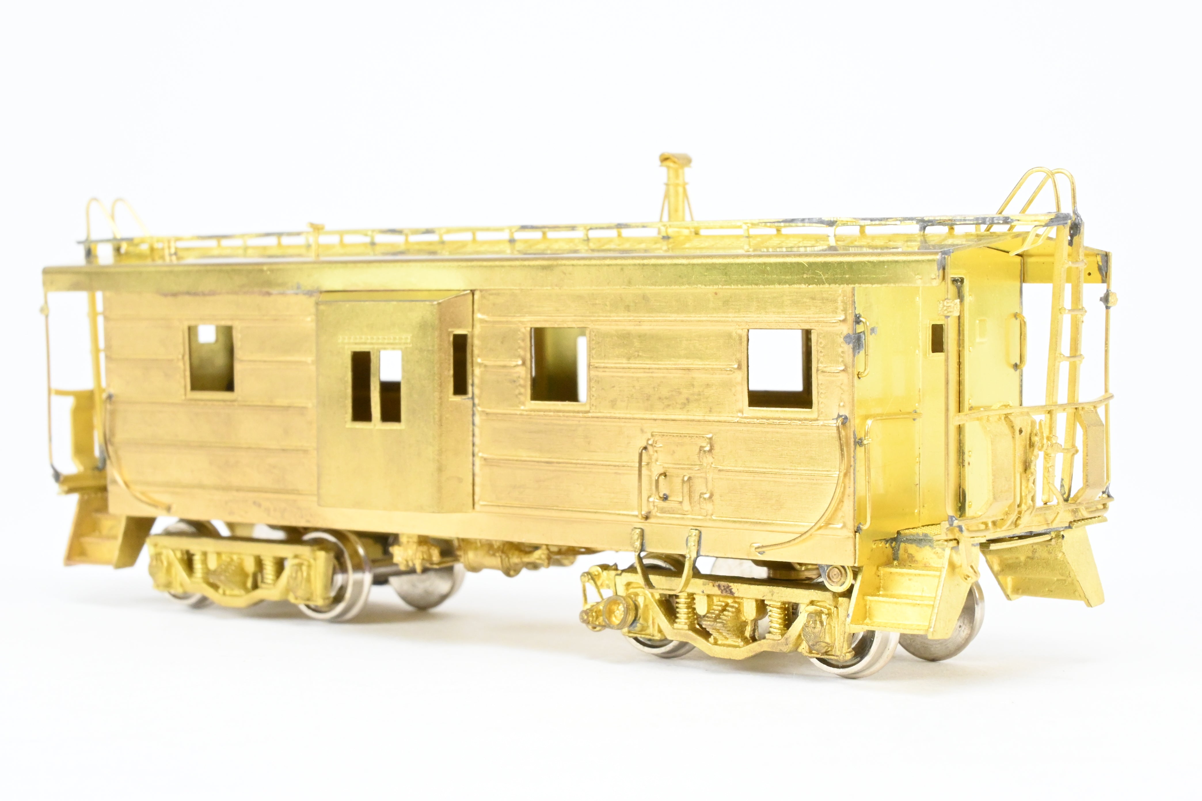 HO Brass OMI MILW - Milwaukee Road Bay Window Caboose with Drop Center Trucks (1991 Run)