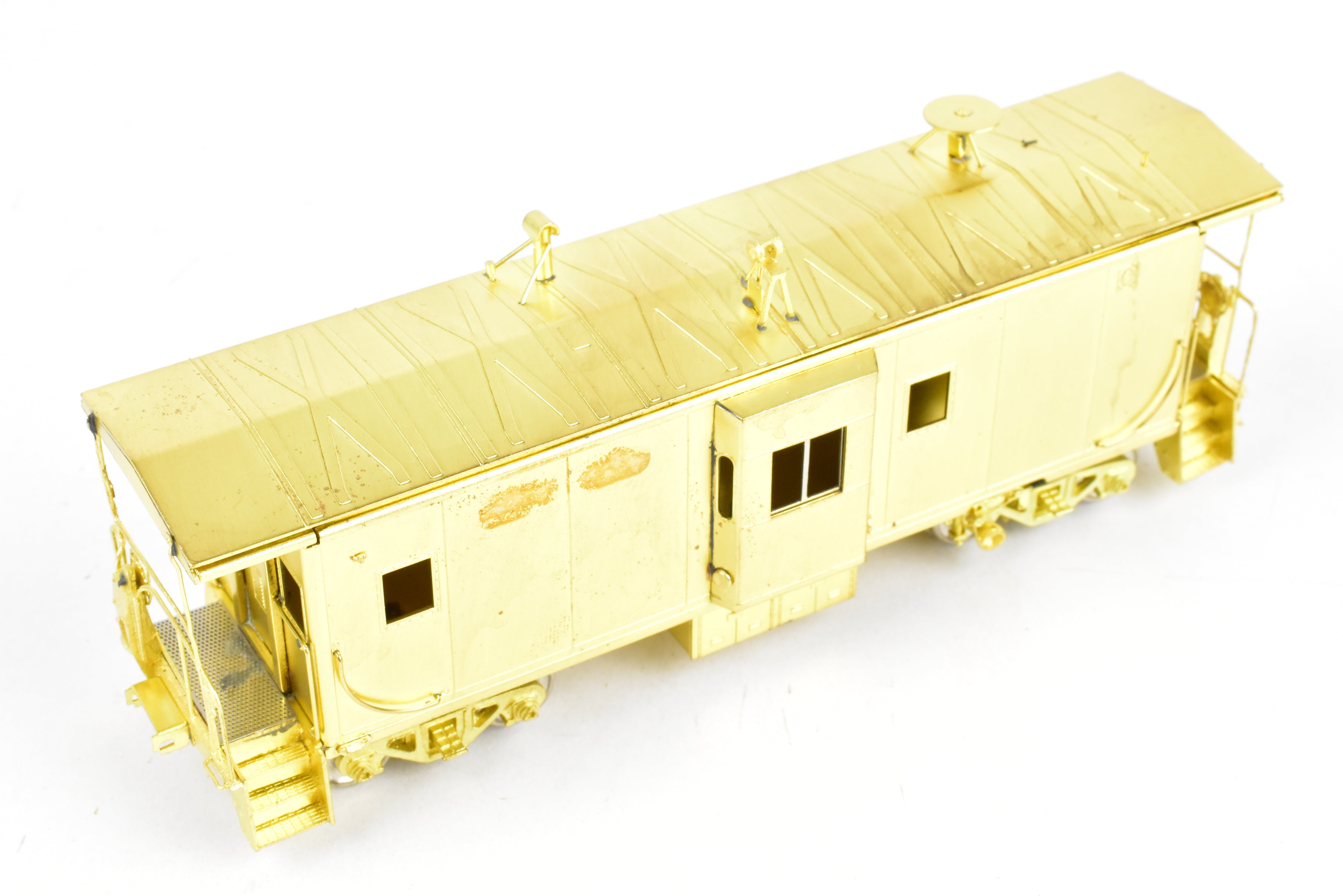 HO Scale Brass Model Train - Overland Models, Inc. (OMI) Southern Pacific (SP) C 50 - 7 Bay Window Caboose in the Series of #4600 - 4659