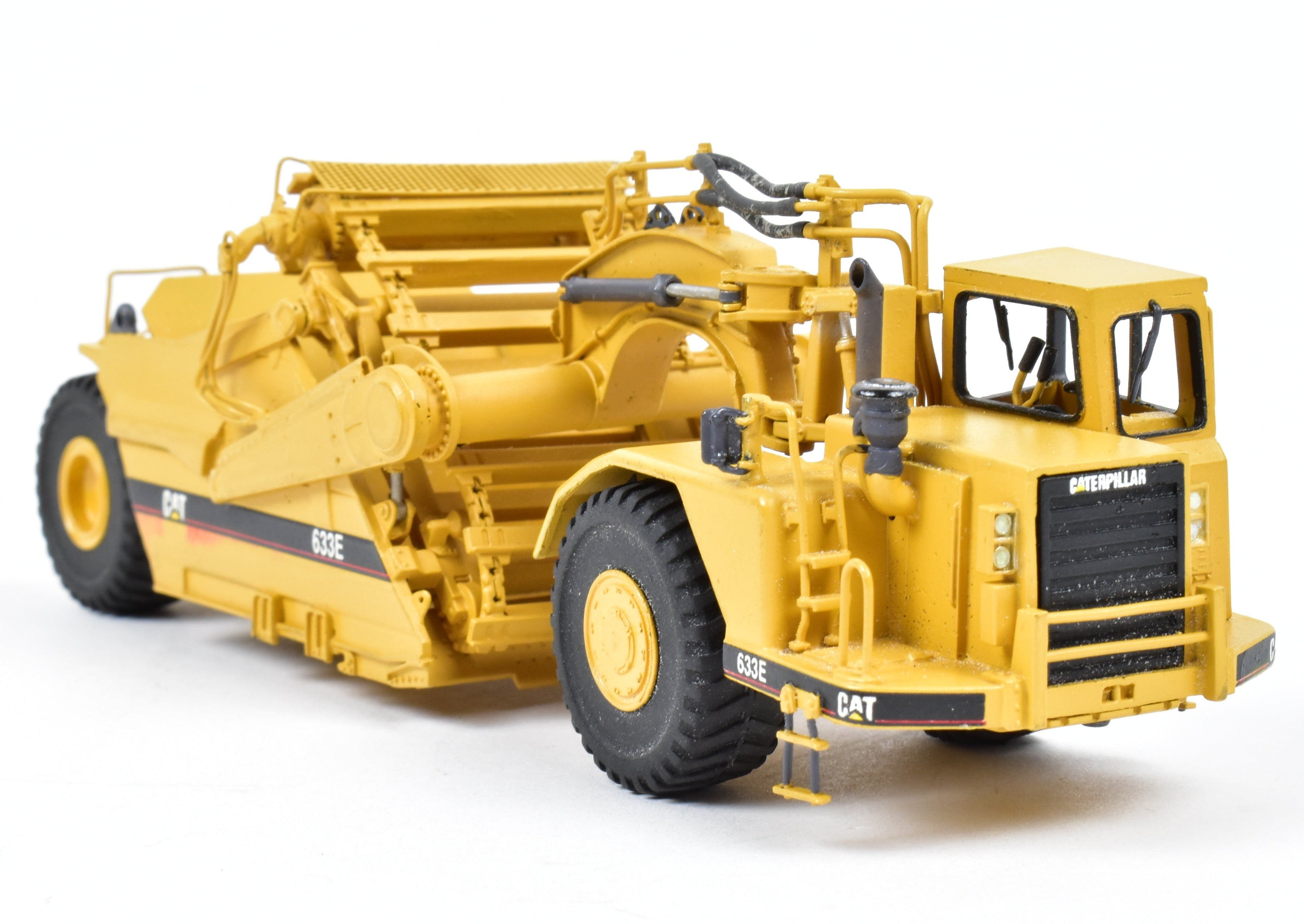 High - Quality HO Scale Brass Construction Model - Factory - Painted Yellow Caterpillar 633E Scraper by CCM Models
