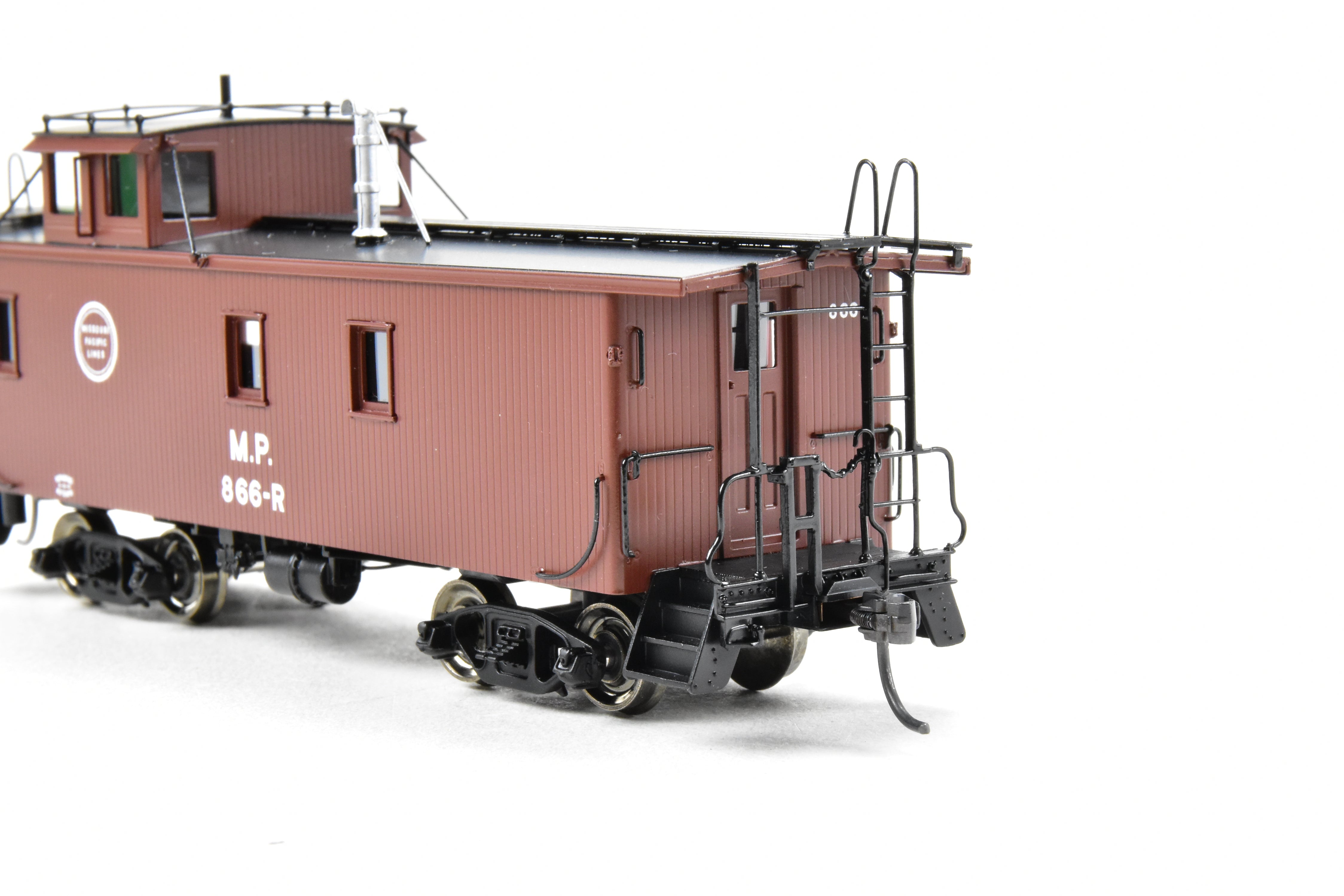HO Scale Brass Missouri Pacific Wood - Side Caboose Model by Overland Models, Inc. with Angled Braces on Cupola and Antenna on Roof, Model Number #866R