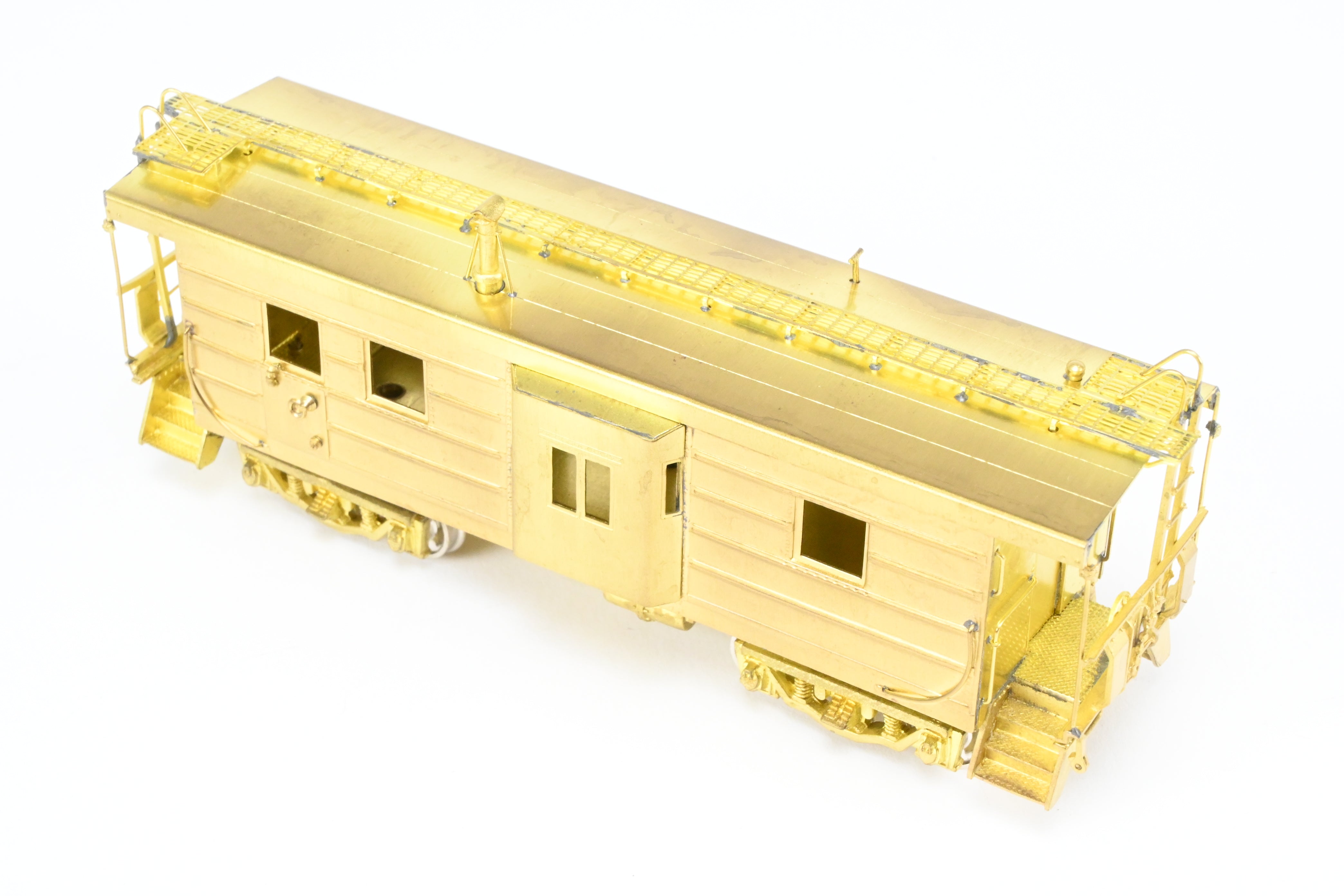 HO Brass OMI MILW - Milwaukee Road Bay Window Caboose with Drop Center Trucks (1991 Run)