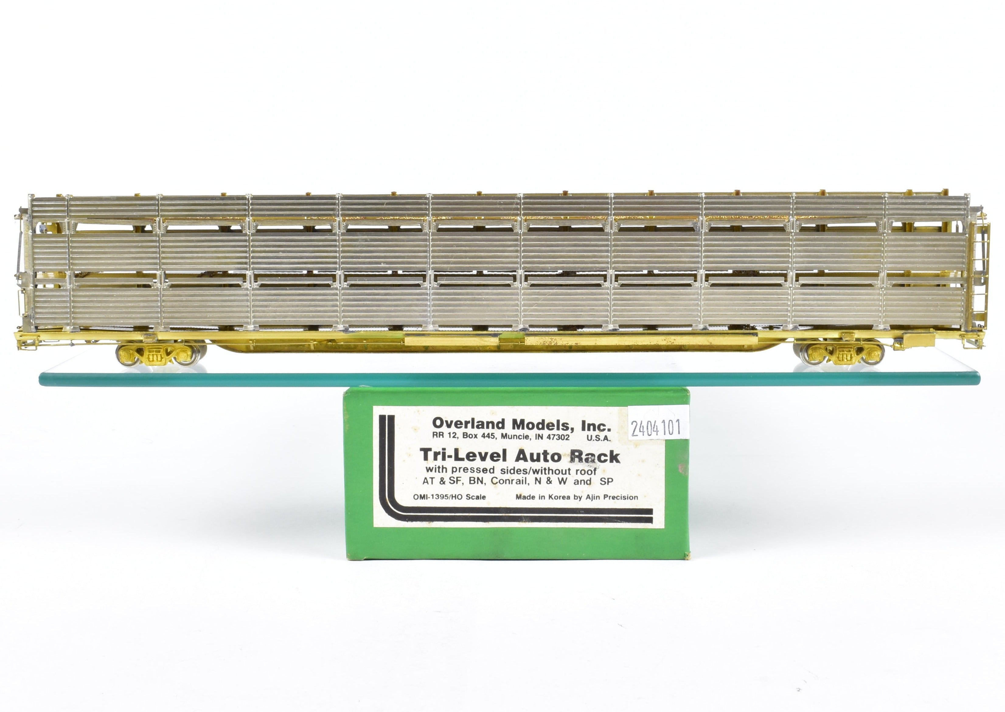 HO Scale Brass Tri - Level Auto Rack Model by Overland Models, Inc. (OMI) for Various Railroads like ATSF, BN, CR, N&W, and SP with Pressed Sides and Optional Roof
