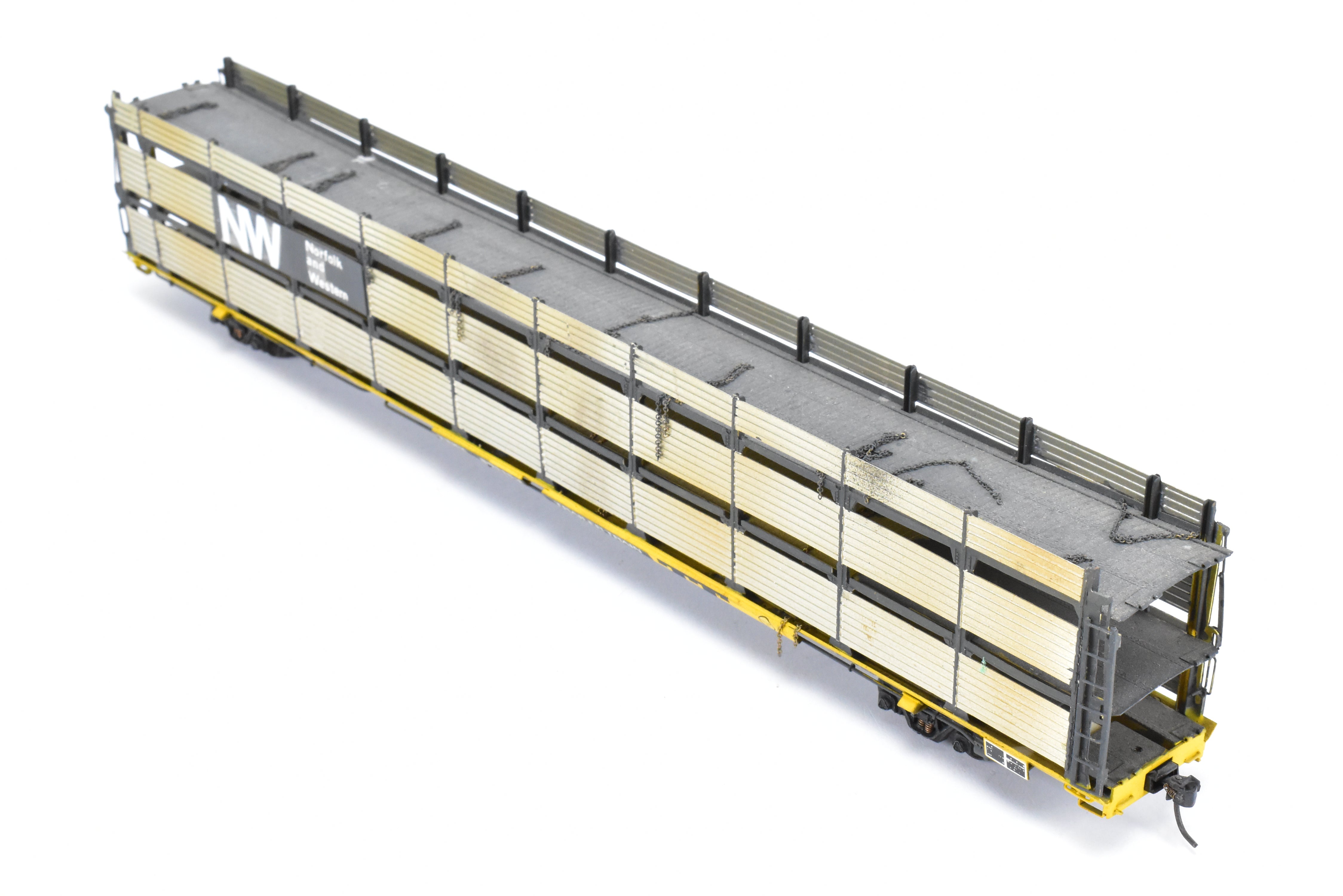 HO Scale Brass Model Tri-Level Auto Rack by Overland Models, Inc. (OMI) - Norfolk & Western Design with Pressed Sides, No Roof, C/P TTKX, and Lightly Weathered Appearance