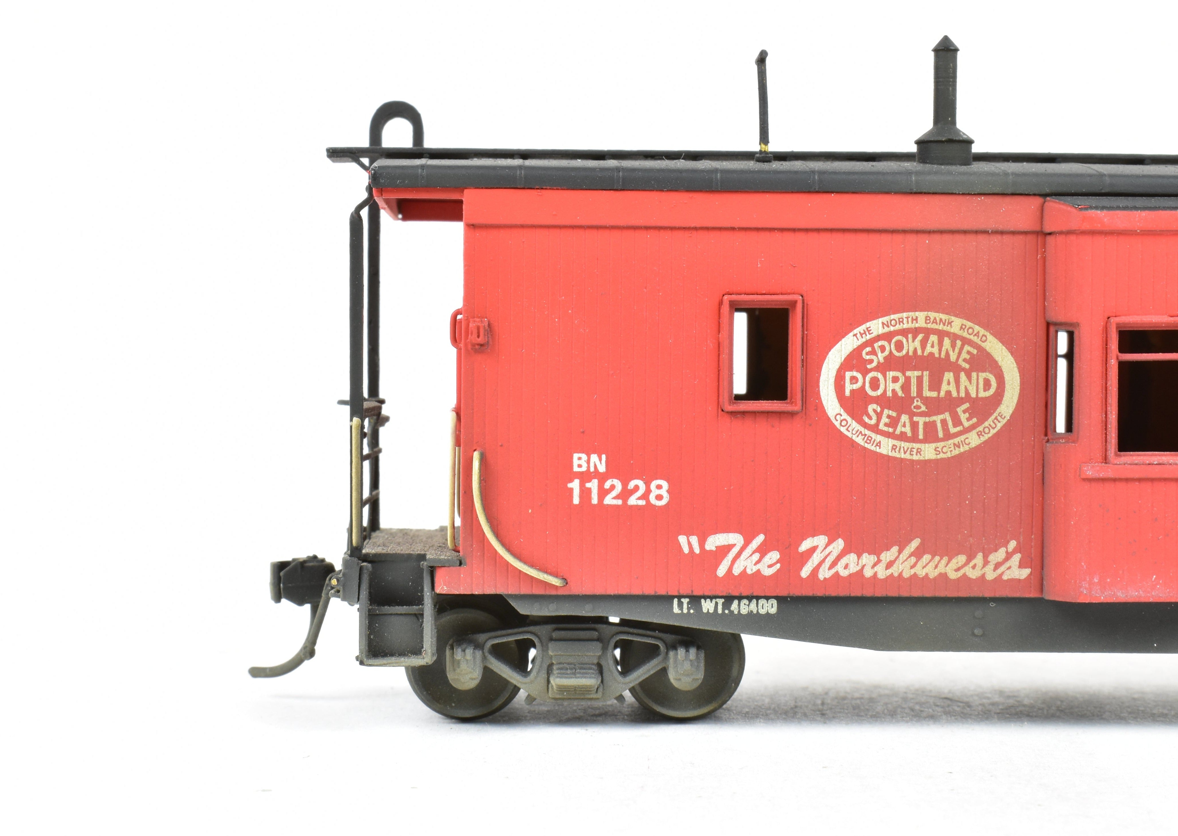 HO Scale Brass OMI - Overland Models, Inc. Model Train Spokane Portland & Seattle Wood Bay Window Caboose with Burlington Northern #11228 Design