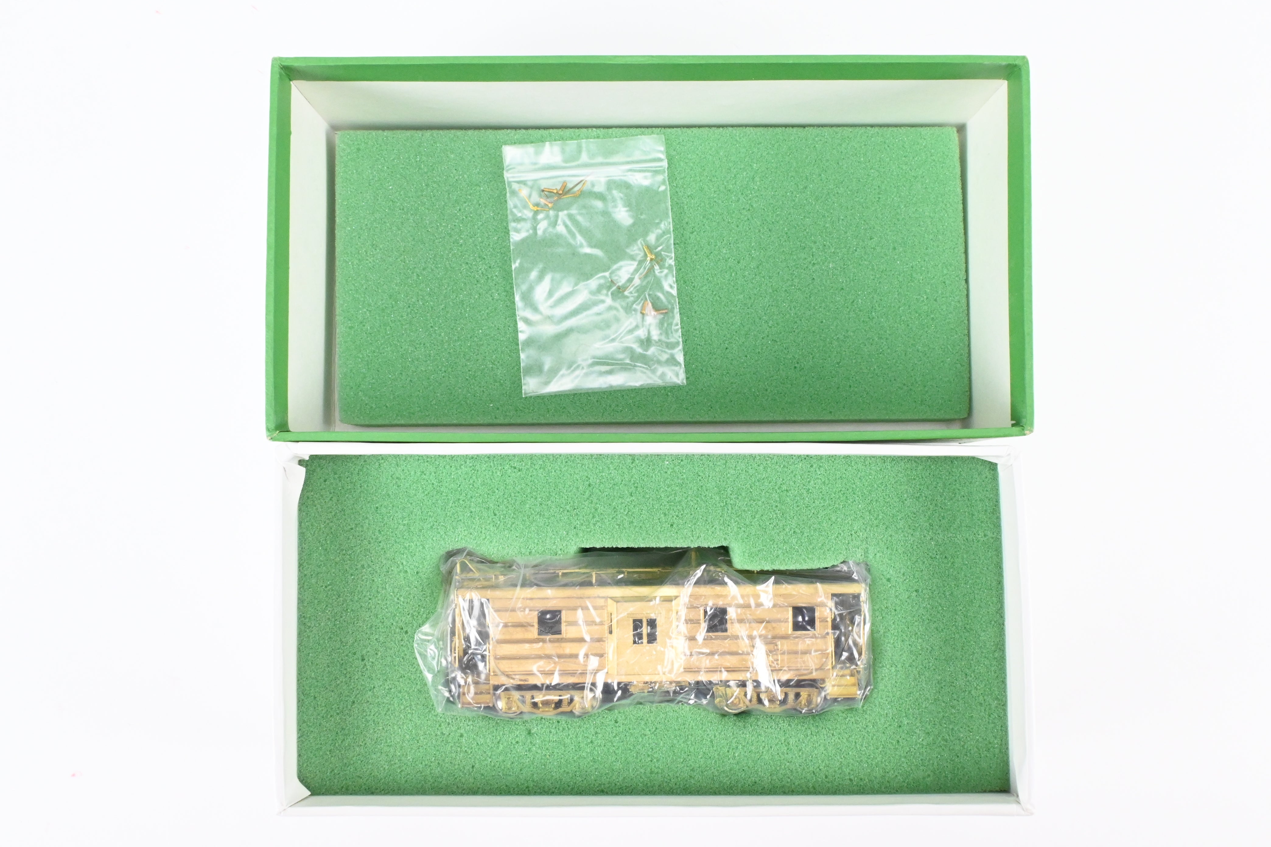 HO Brass OMI MILW - Milwaukee Road Bay Window Caboose with Drop Center Trucks (1991 Run)