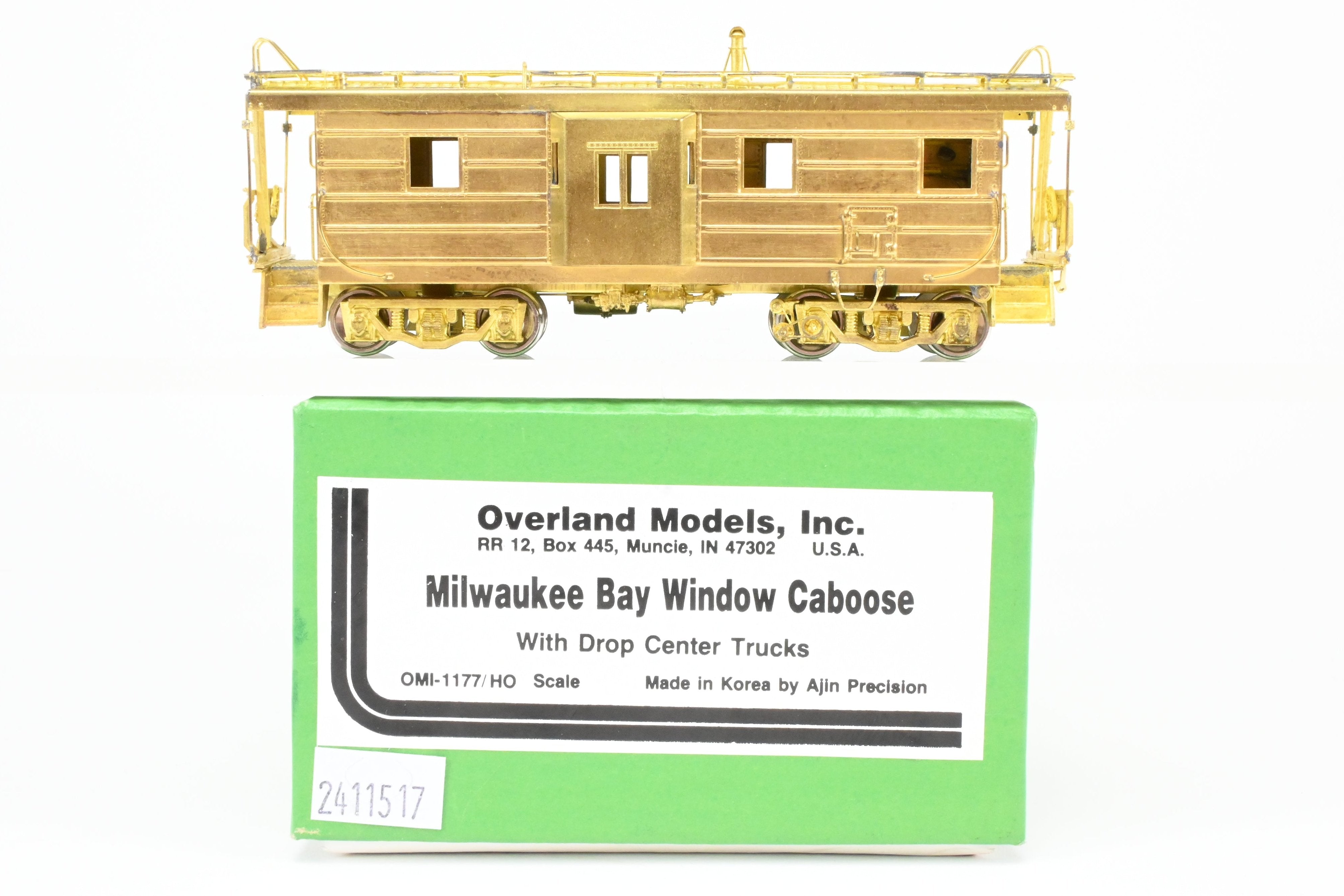 HO Brass OMI MILW - Milwaukee Road Bay Window Caboose with Drop Center Trucks (1991 Run)