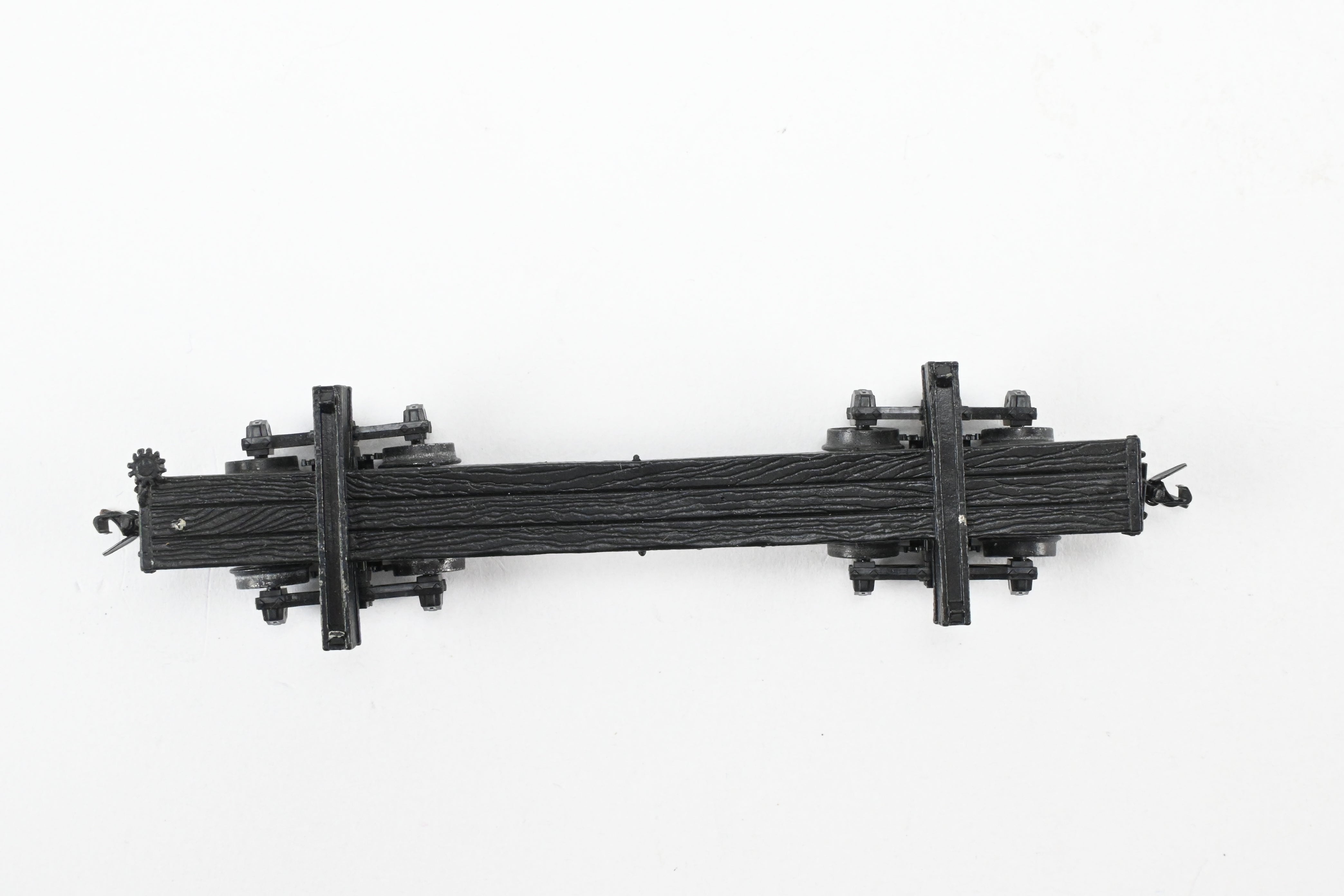 HOn3 Micro-Trains 30’ Factory-Painted Unlettered Skeleton Log Car with Load