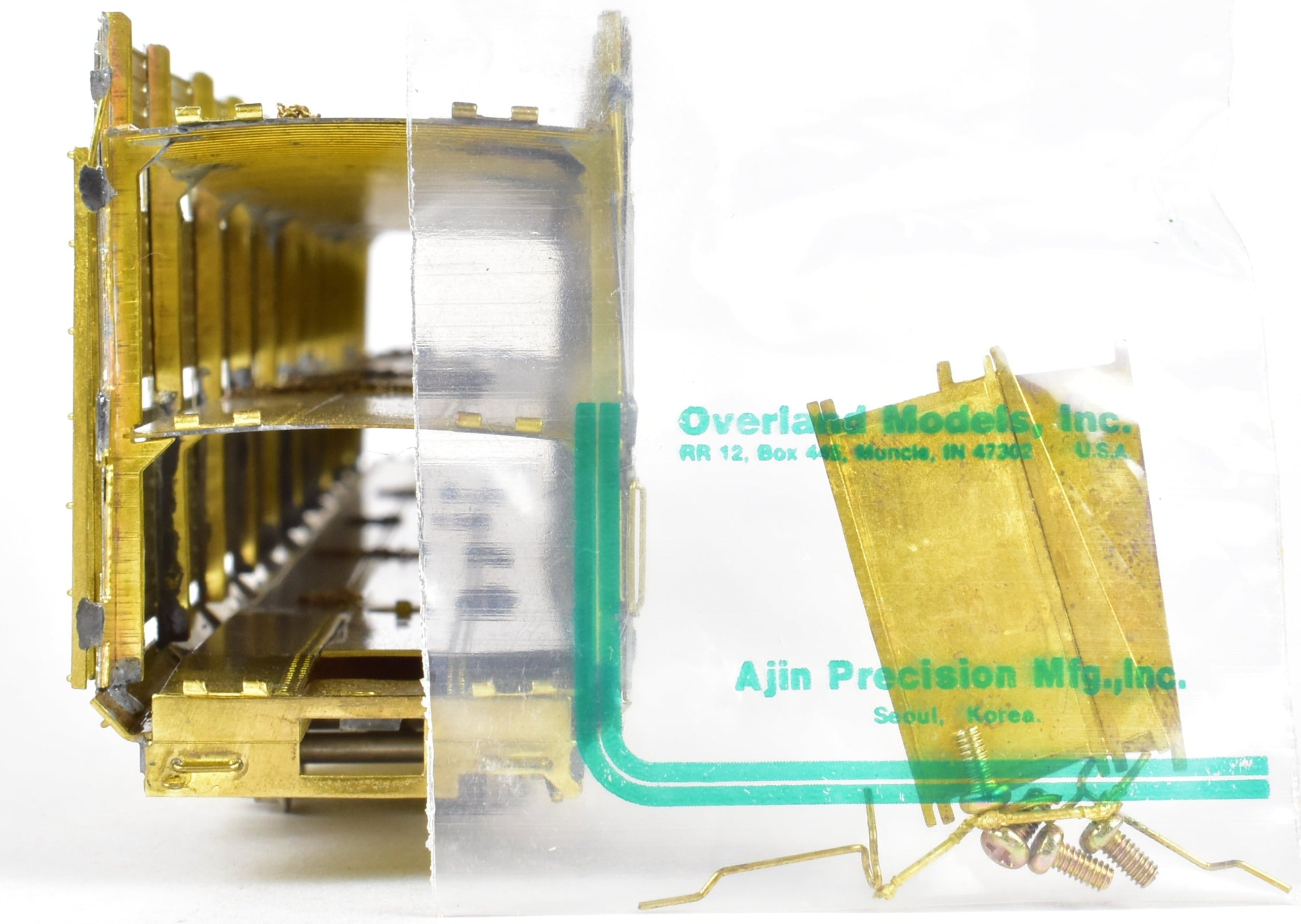 HO Scale Brass Tri - Level Auto Rack Model by Overland Models, Inc. (OMI) for Various Railroads like ATSF, BN, CR, N&W, and SP with Pressed Sides and Optional Roof