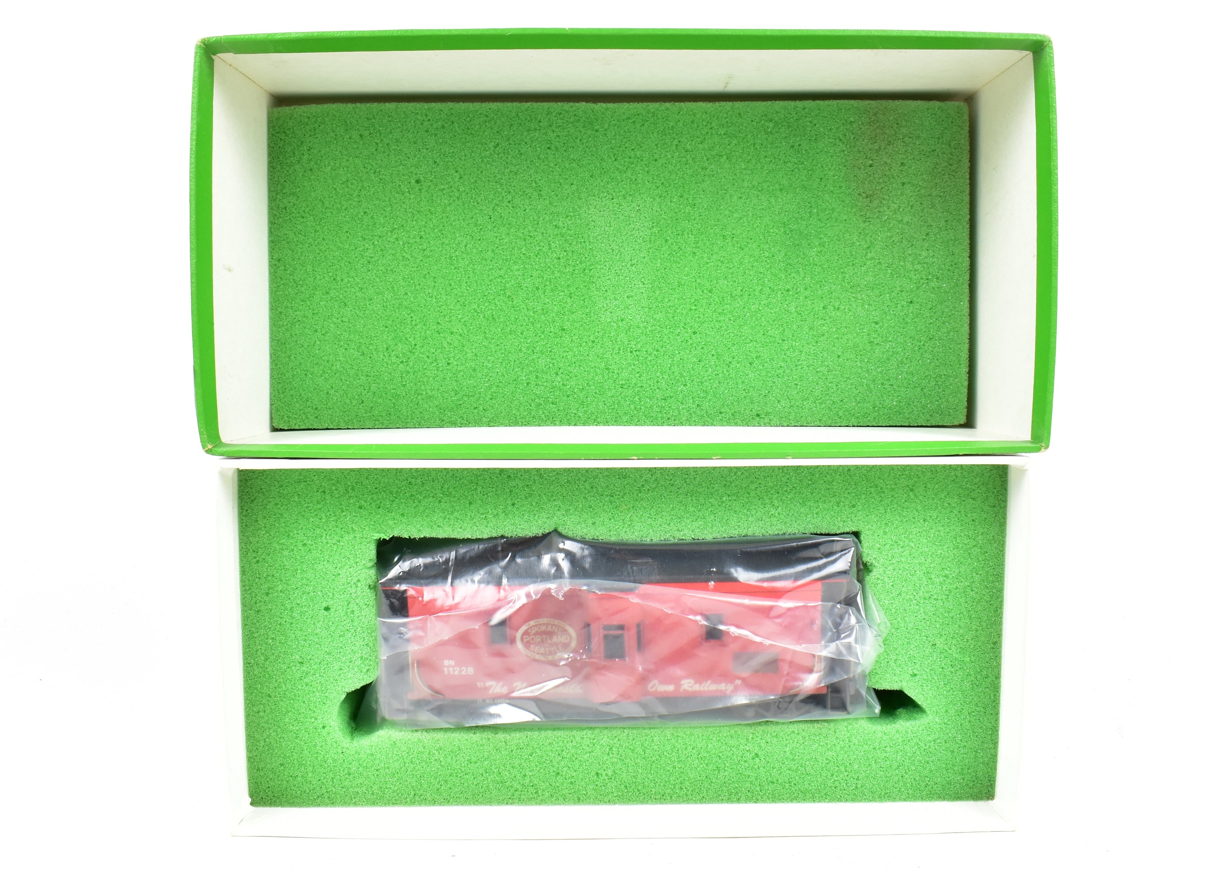 HO Scale Brass OMI - Overland Models, Inc. Model Train Spokane Portland & Seattle Wood Bay Window Caboose with Burlington Northern #11228 Design