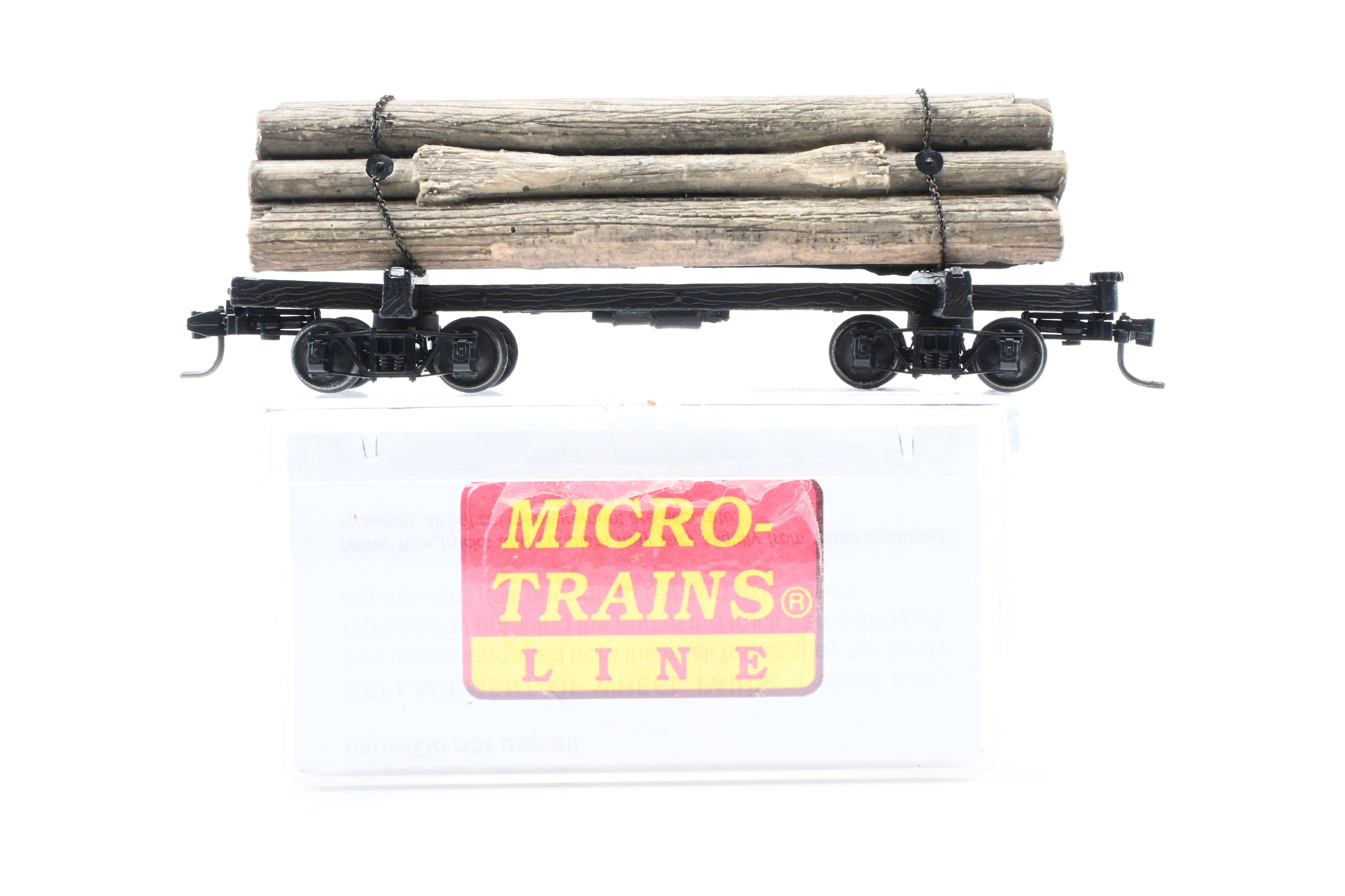 HOn3 Micro-Trains 30’ Factory-Painted Unlettered Skeleton Log Car with Load