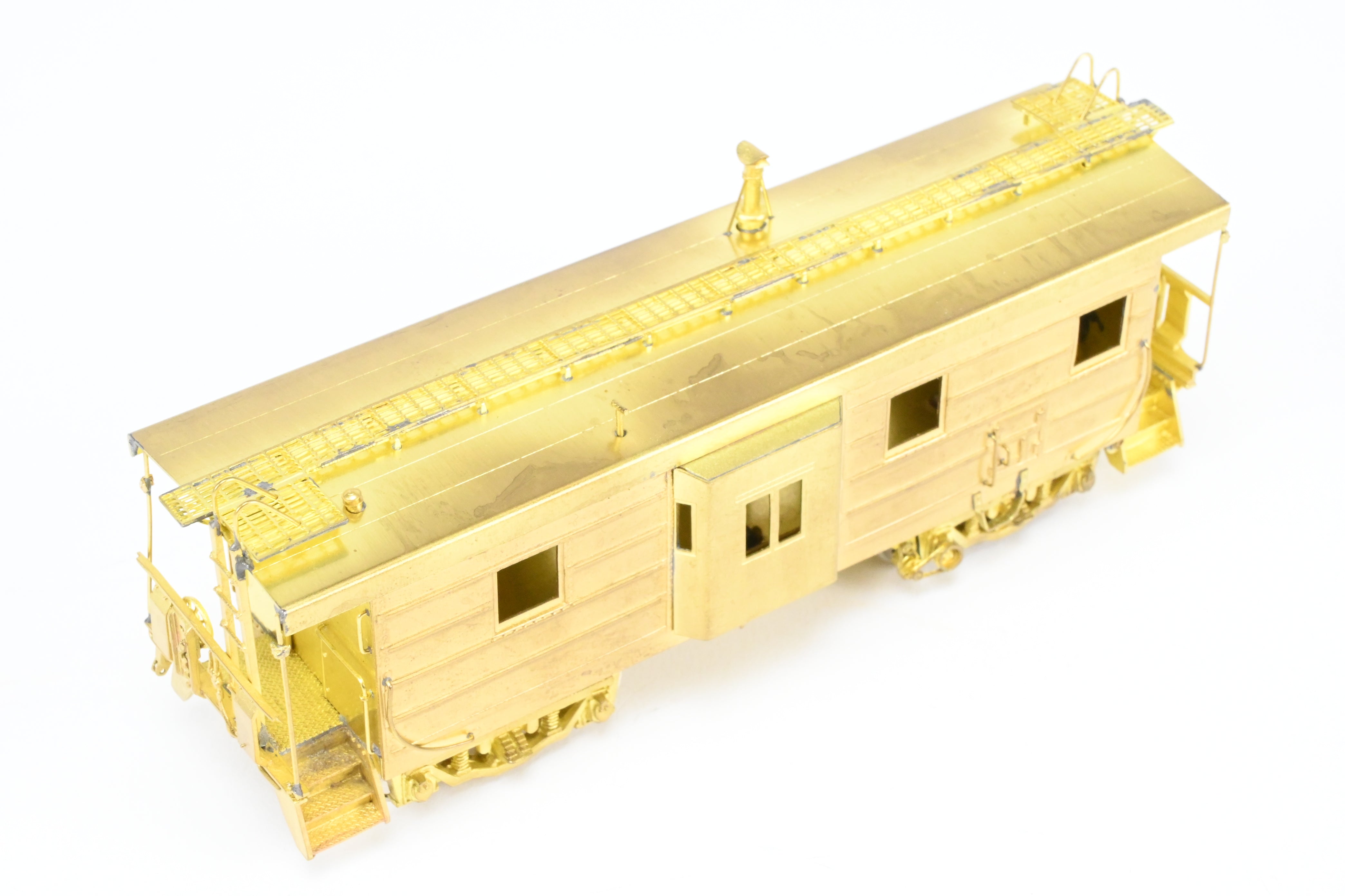 HO Brass OMI MILW - Milwaukee Road Bay Window Caboose with Drop Center Trucks (1991 Run)